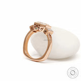 Lab diamond elongated asscher three stone ring with geometric baguette accents and bezel setting