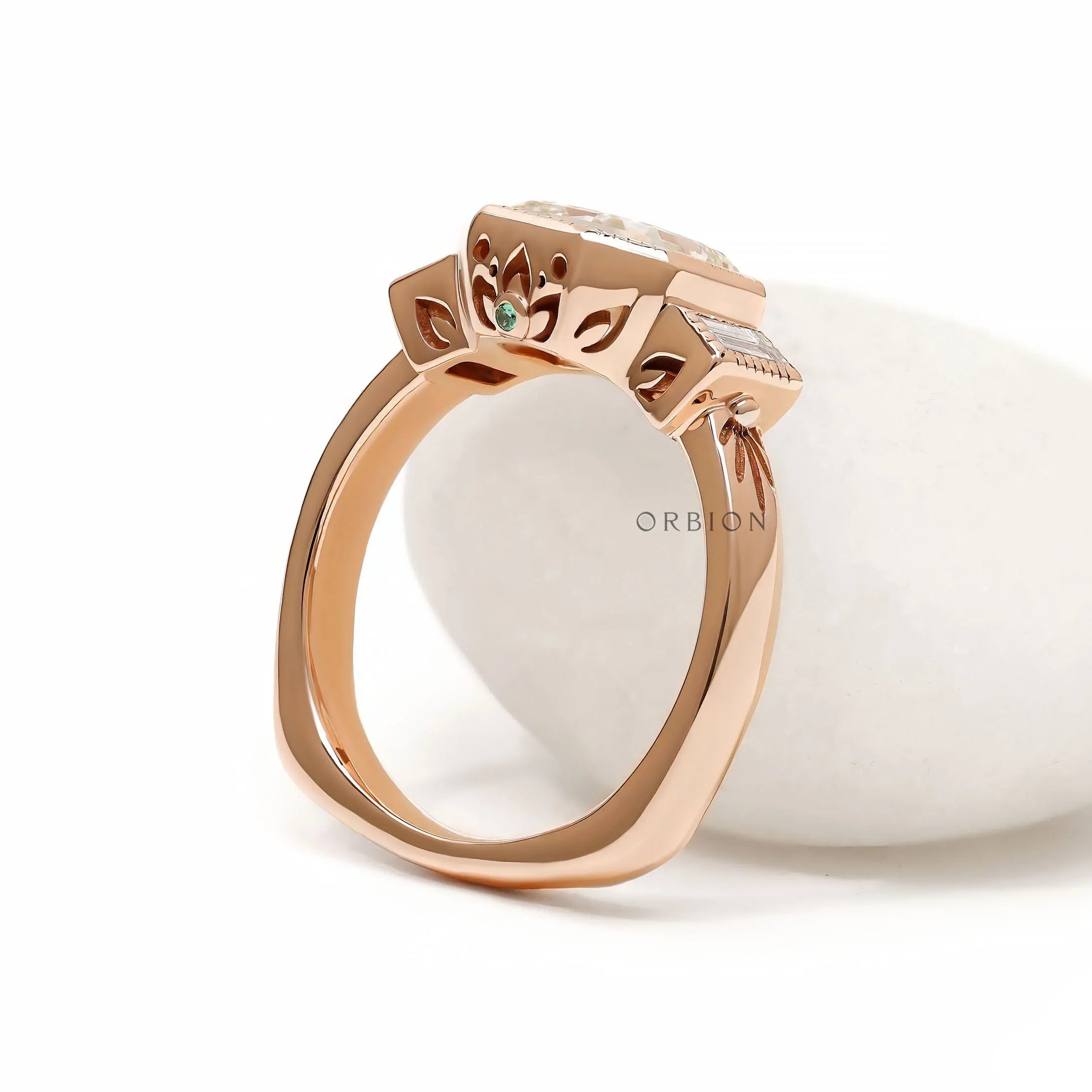 Lab diamond elongated asscher three stone ring with geometric baguette accents and bezel setting