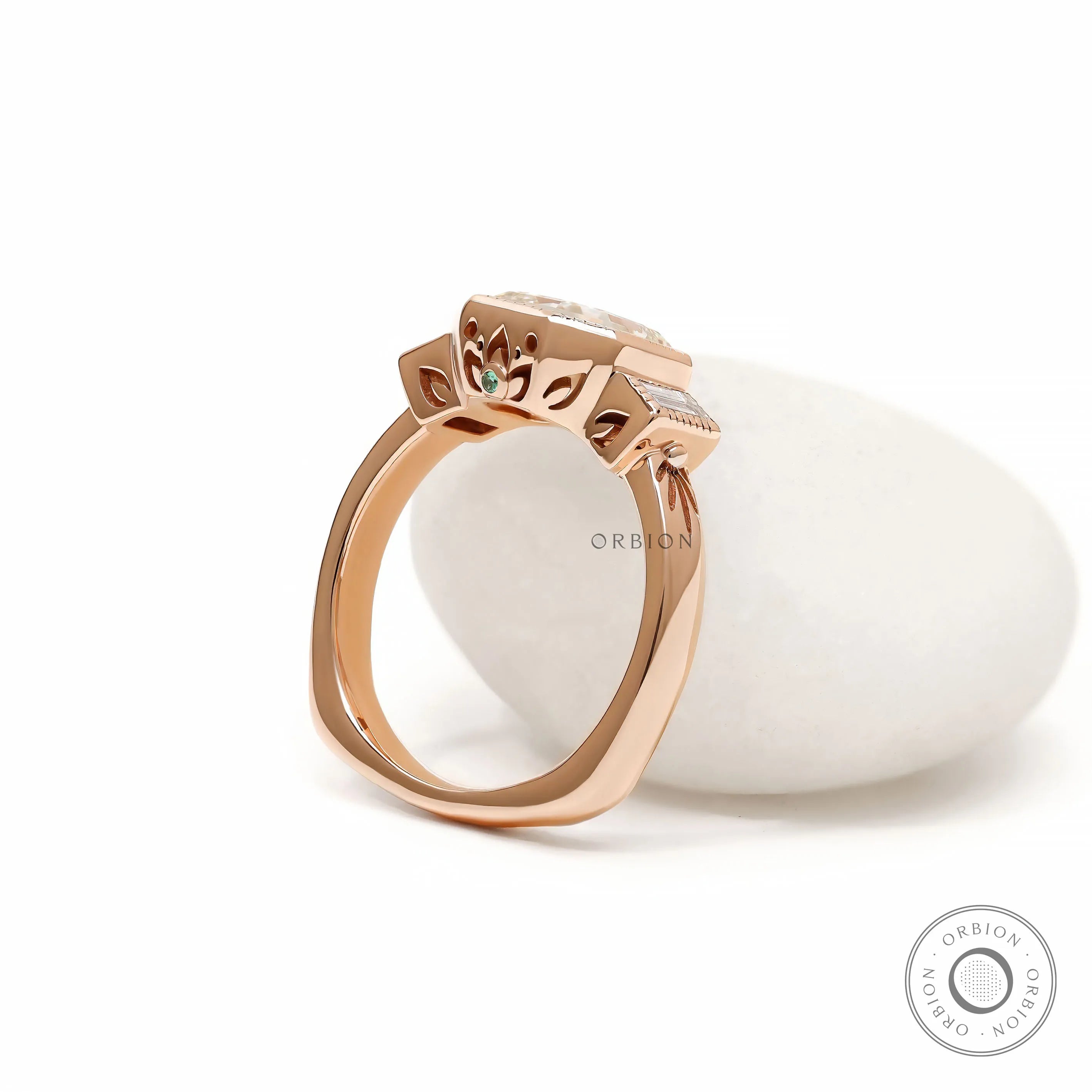 Lab diamond elongated asscher three stone ring with geometric baguette accents and bezel setting