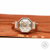 Elongated asscher cut three stone engagement ring with bezel set lab diamond or moissanite