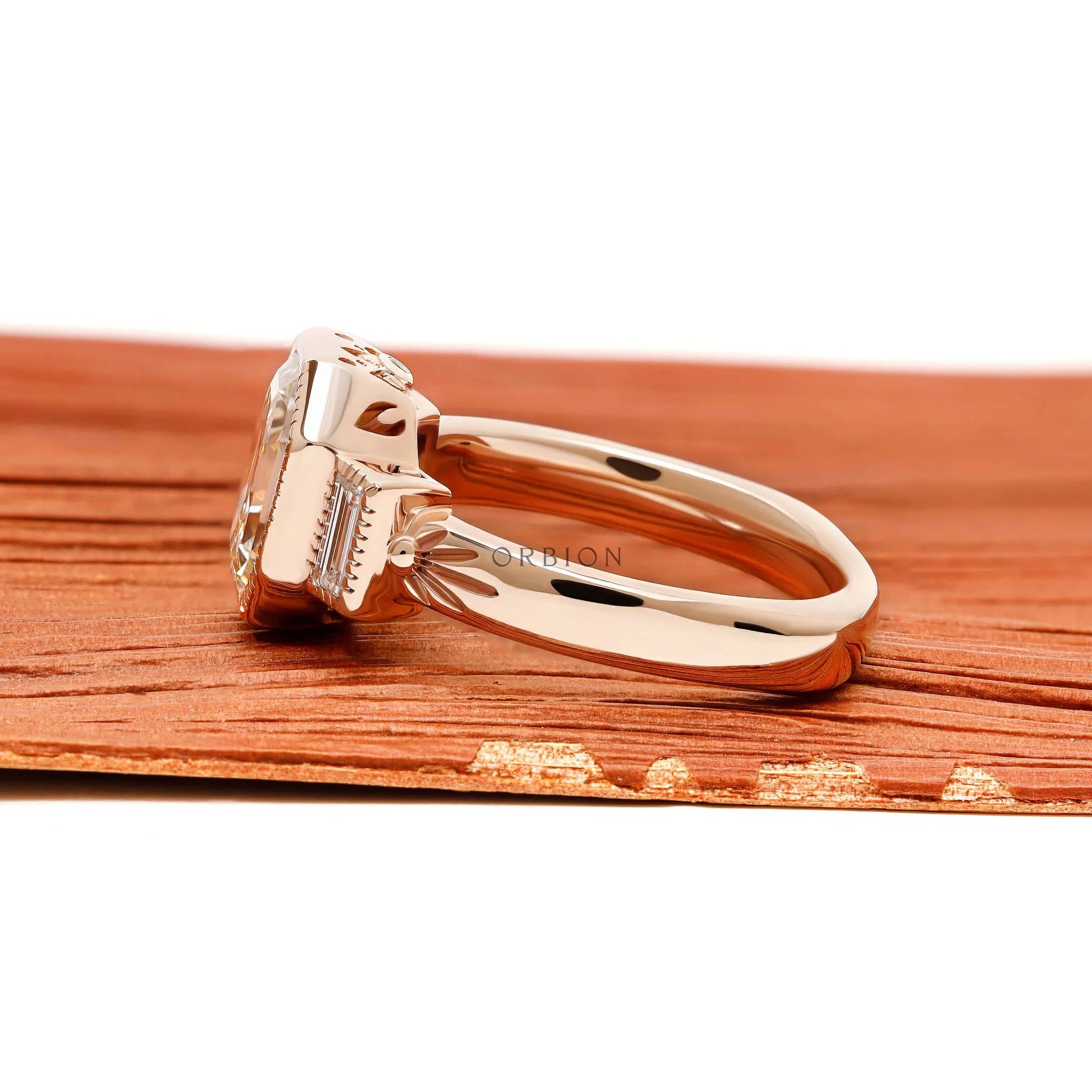 18k rose gold art deco engagement ring with elongated Asscher center and baguette side stones