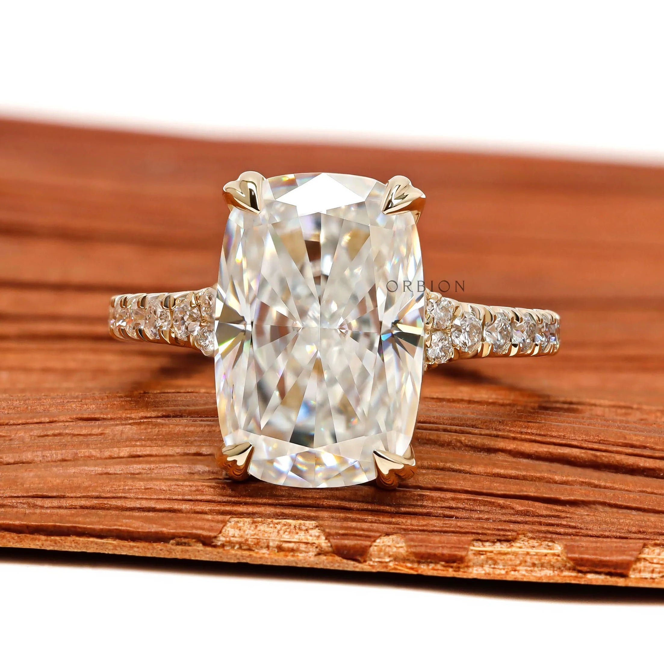  4 CT Elongated Cushion Moissanite Engagement Ring with Raised Prongs in Yellow Gold
