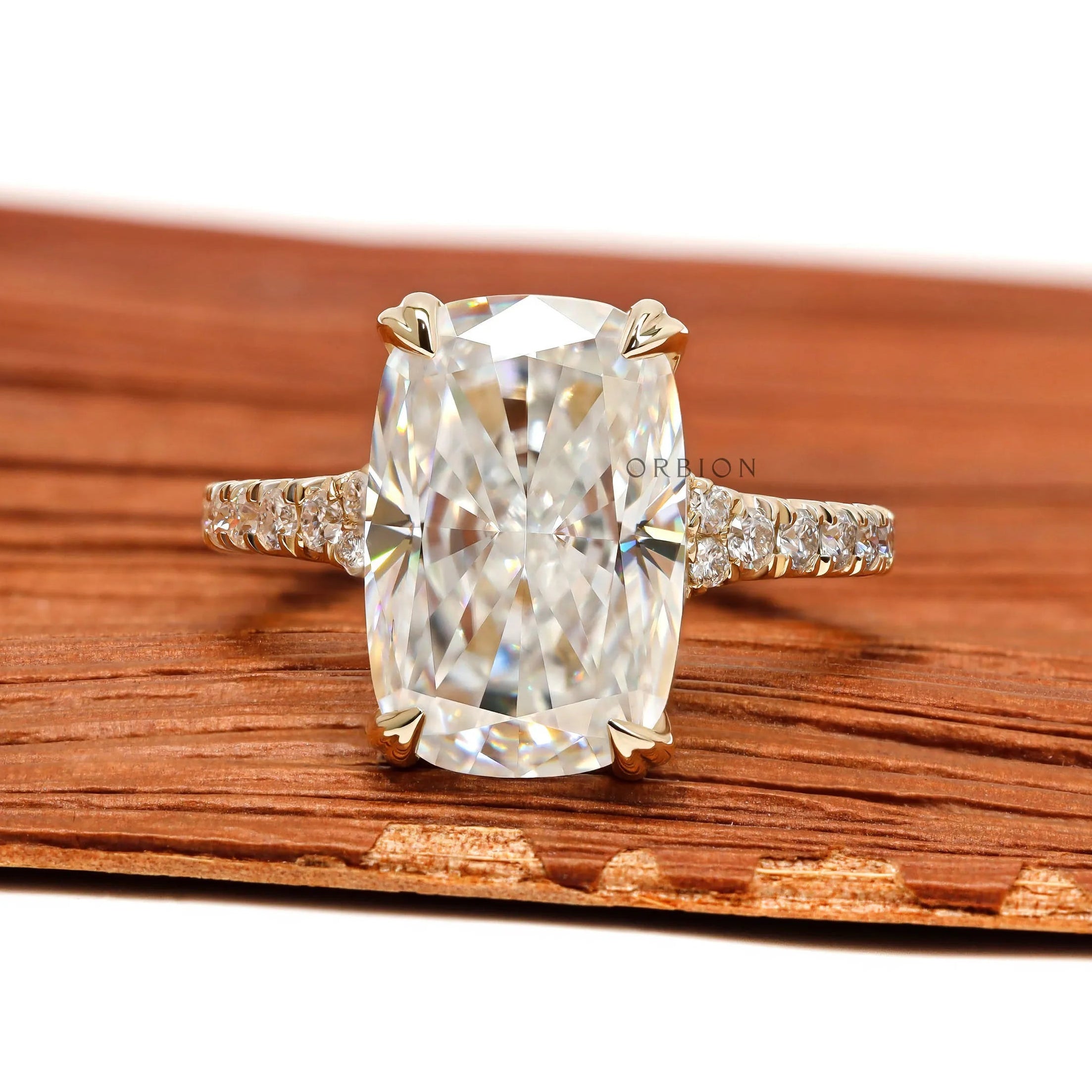4 CT Elongated Cushion Moissanite Engagement Ring with Raised Prongs in Yellow Gold
