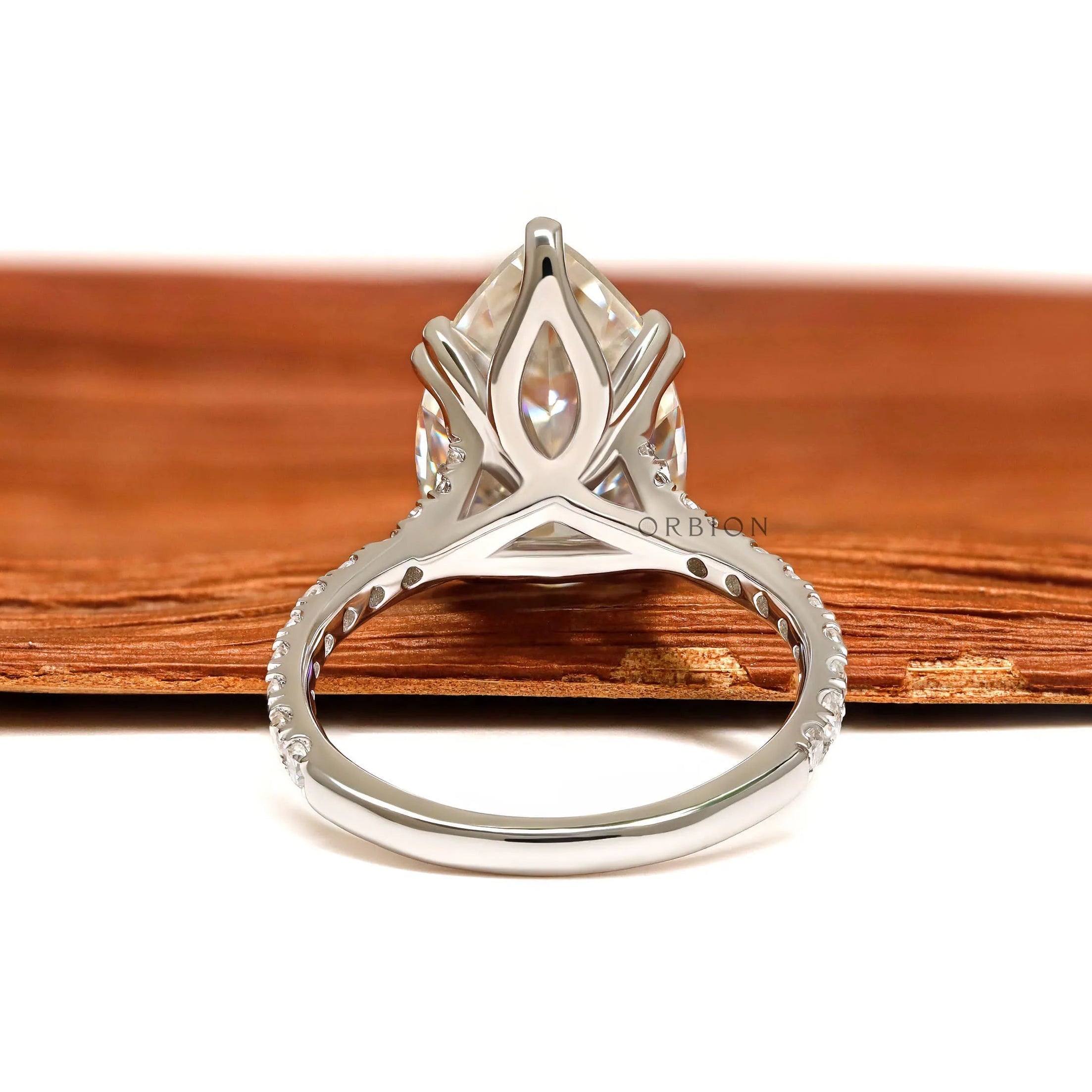 4 carat pear moissanite ring for proposal and bridal jewelry