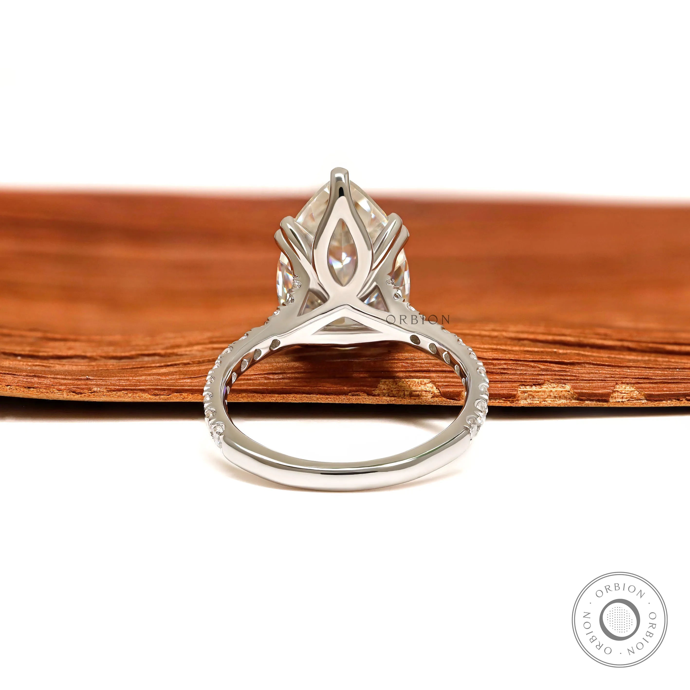 4 carat pear moissanite ring for proposal and bridal jewelry