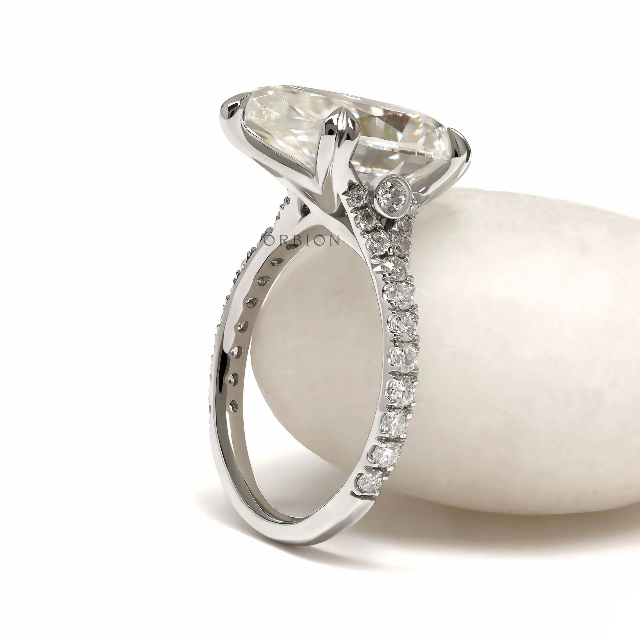 Pear cut lab diamond engagement ring with pave split shank in white gold