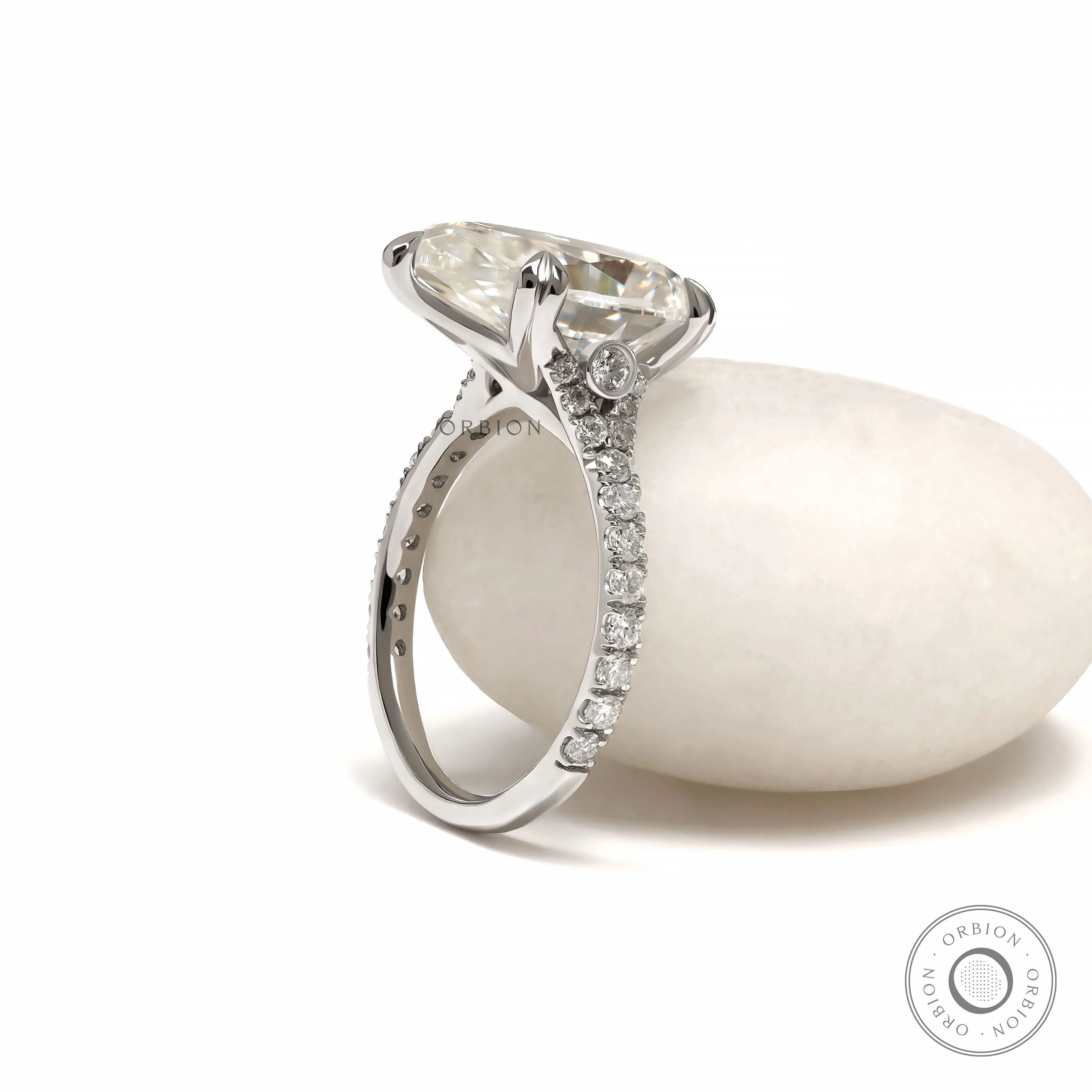 Pear cut lab diamond engagement ring with pave split shank in white gold