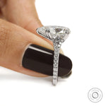 Elegant pear shaped solitaire ring in 10k white gold for women
