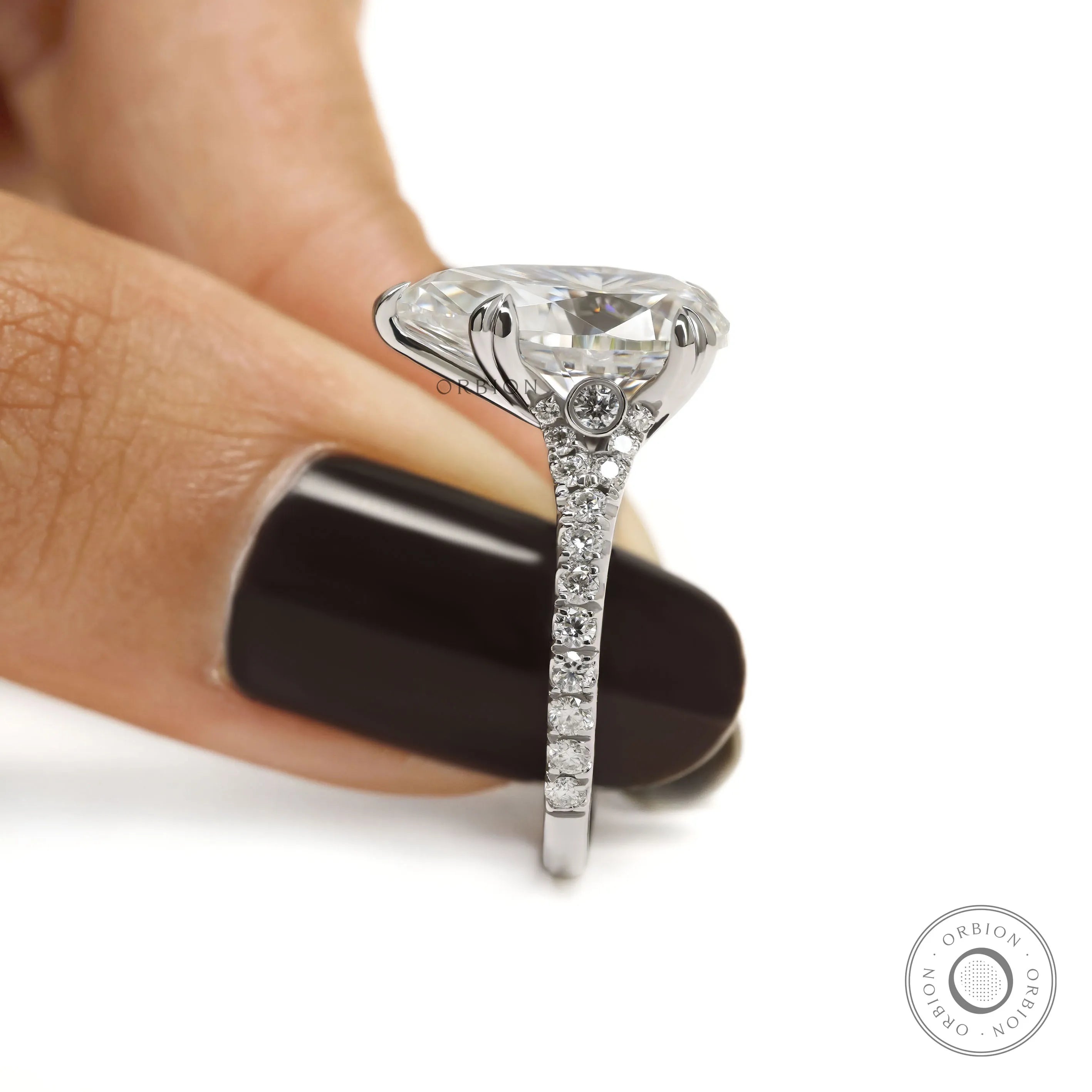 Elegant pear shaped solitaire ring in 10k white gold for women