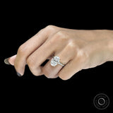 10k yellow gold cathedral ring with 5.50 CT oval moissanite or lab diamond solitaire and pave split shank