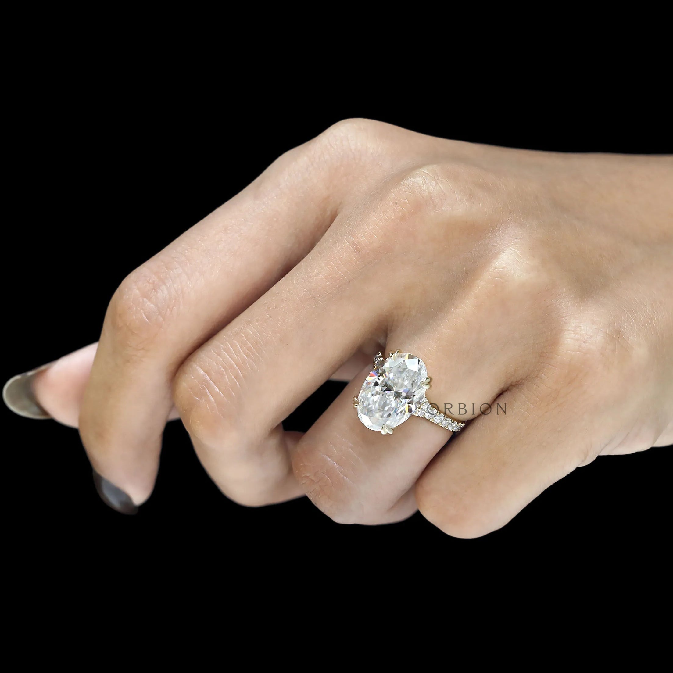 10k yellow gold cathedral ring with 5.50 CT oval moissanite or lab diamond solitaire and pave split shank