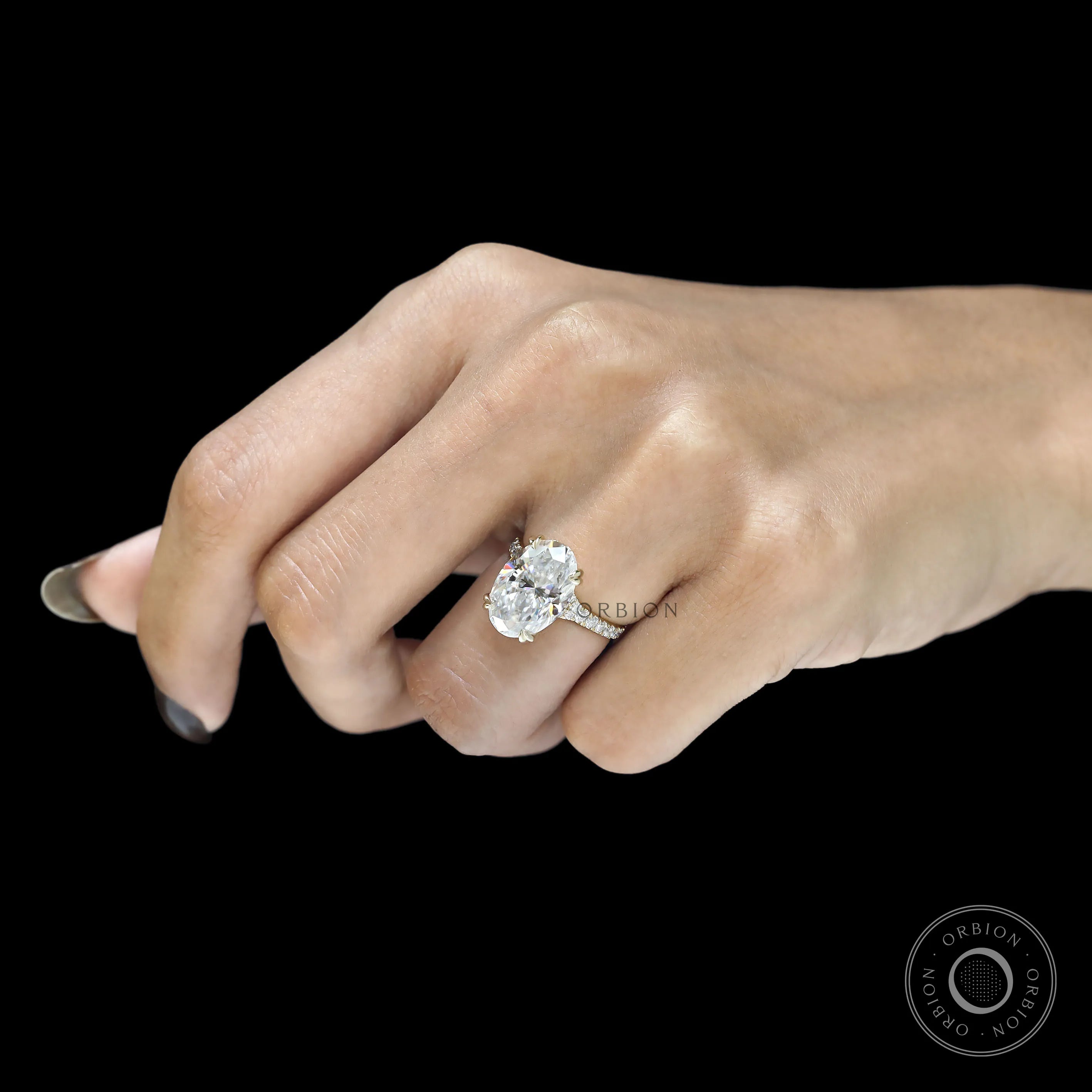 10k yellow gold cathedral ring with 5.50 CT oval moissanite or lab diamond solitaire and pave split shank