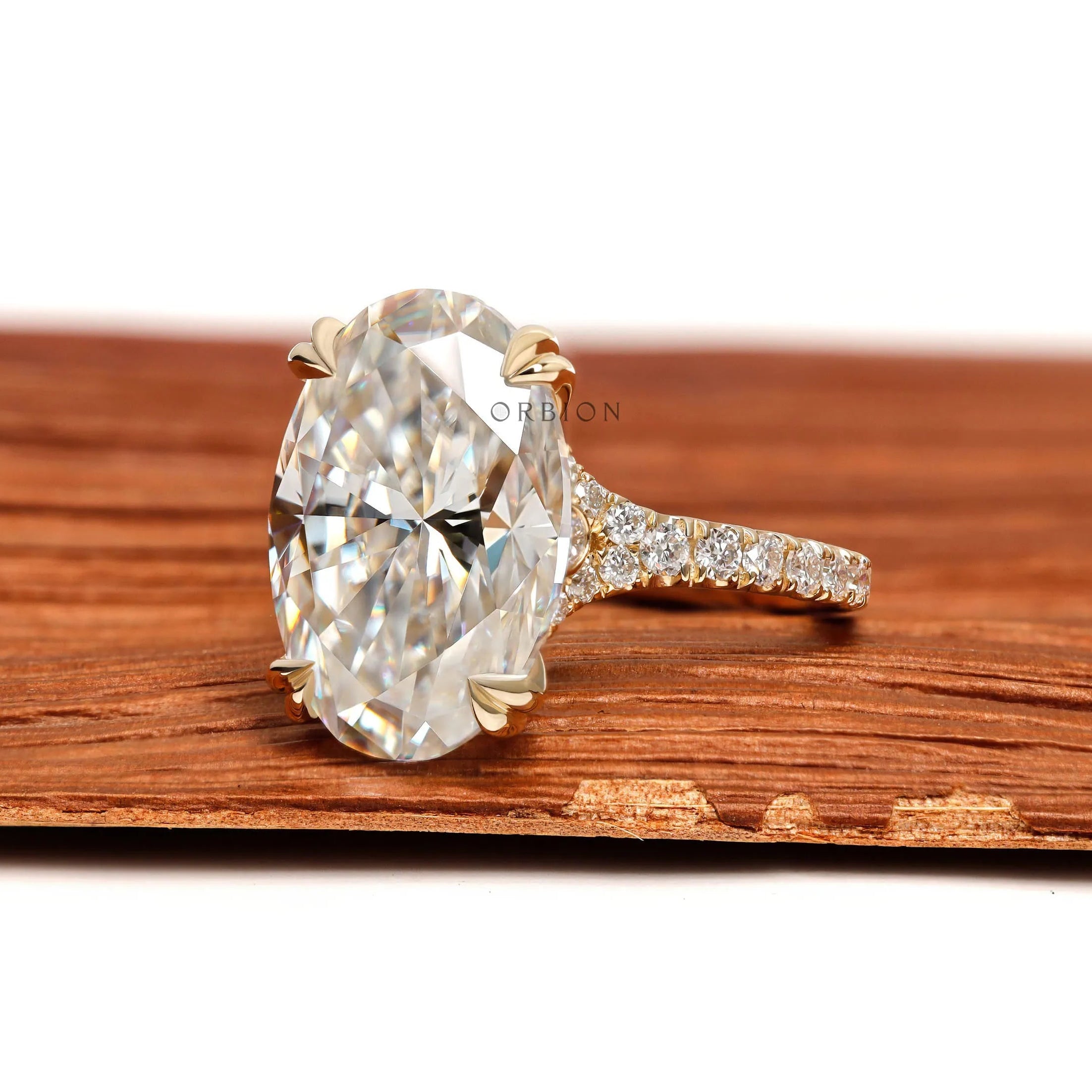 10k yellow gold cathedral ring with 5.50 CT oval moissanite or lab diamond solitaire, pavé split shank