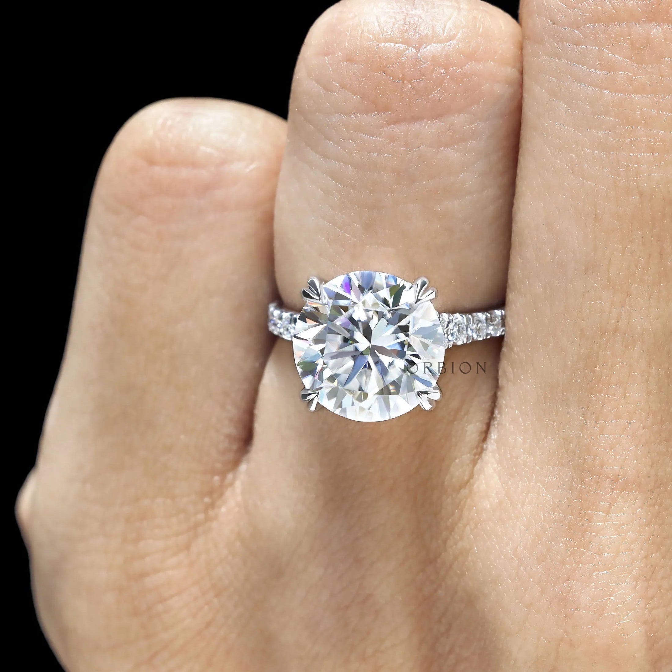 4.7 CT round moissanite cathedral engagement ring with pave split shank in 10k white gold