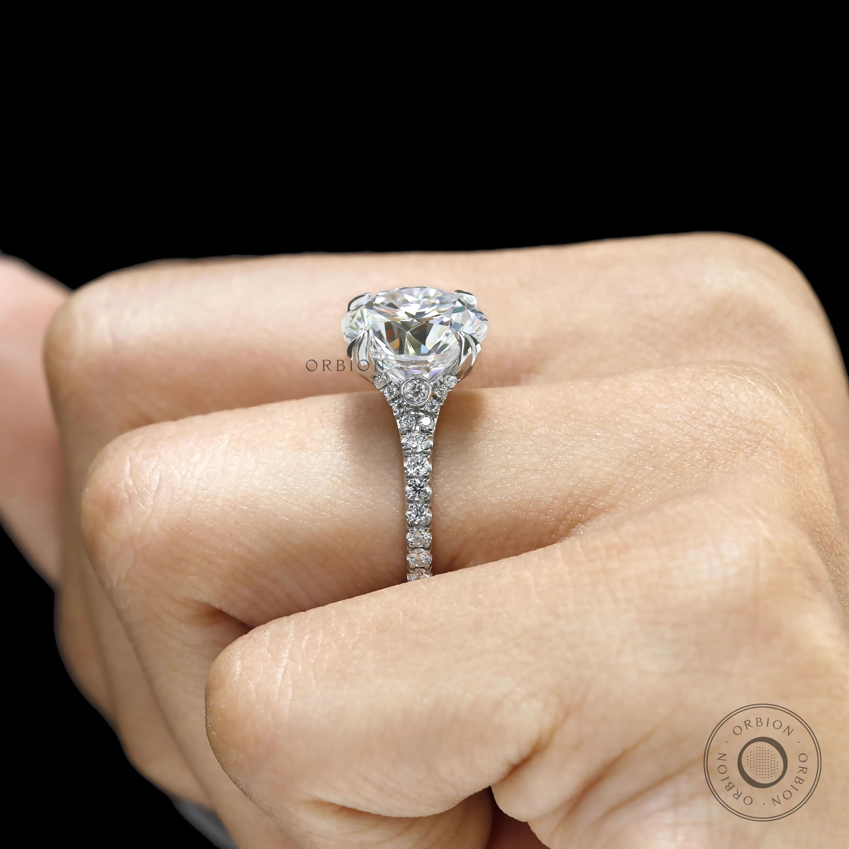 Round cut moissanite or lab diamond engagement ring, split shank cathedral band, 10k white gold
