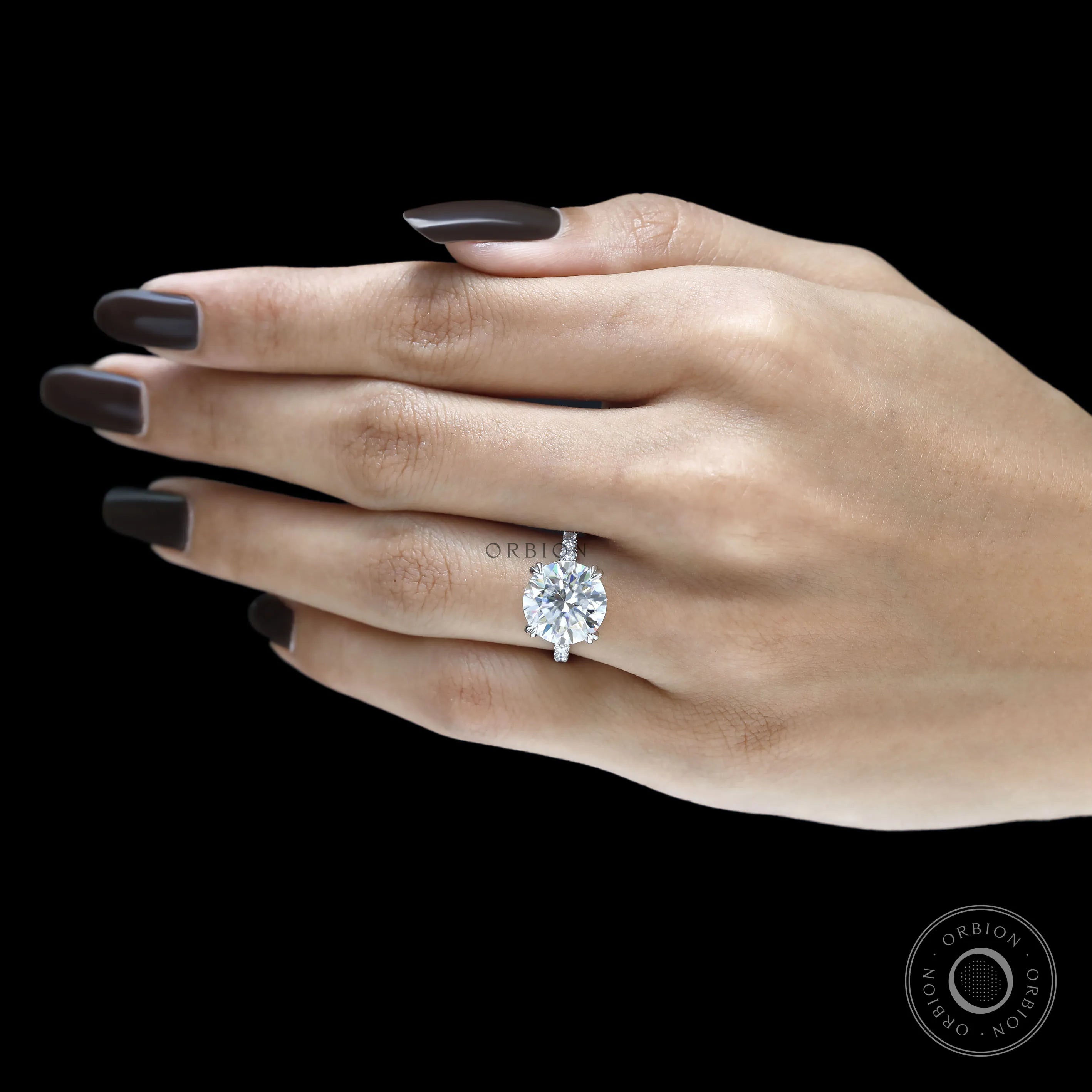 Cathedral split shank ring with 10.5 MM round moissanite solitaire, elegant 10k white gold