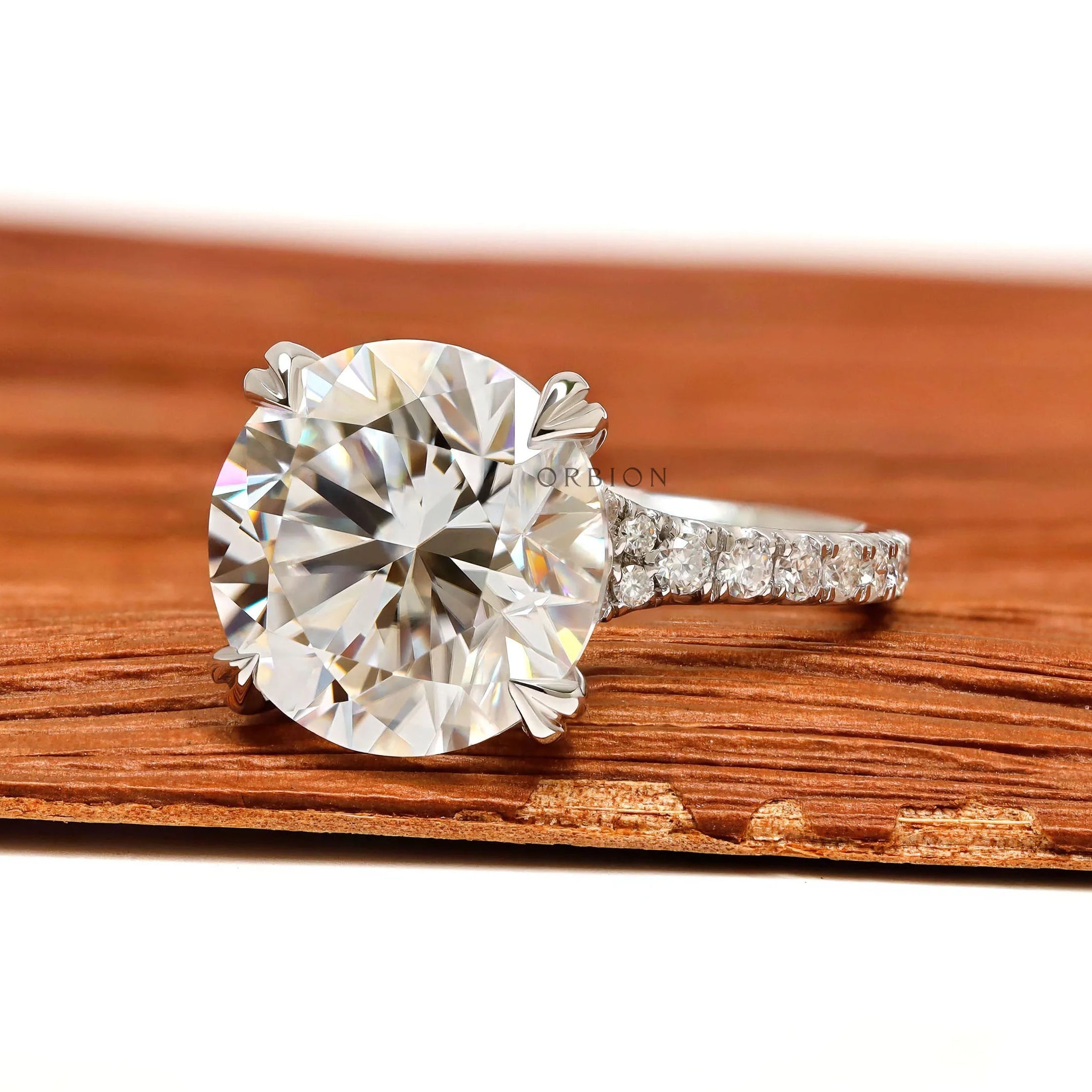 Elegant 4.7 CT round cut moissanite engagement ring in 10k white gold with pave split shank