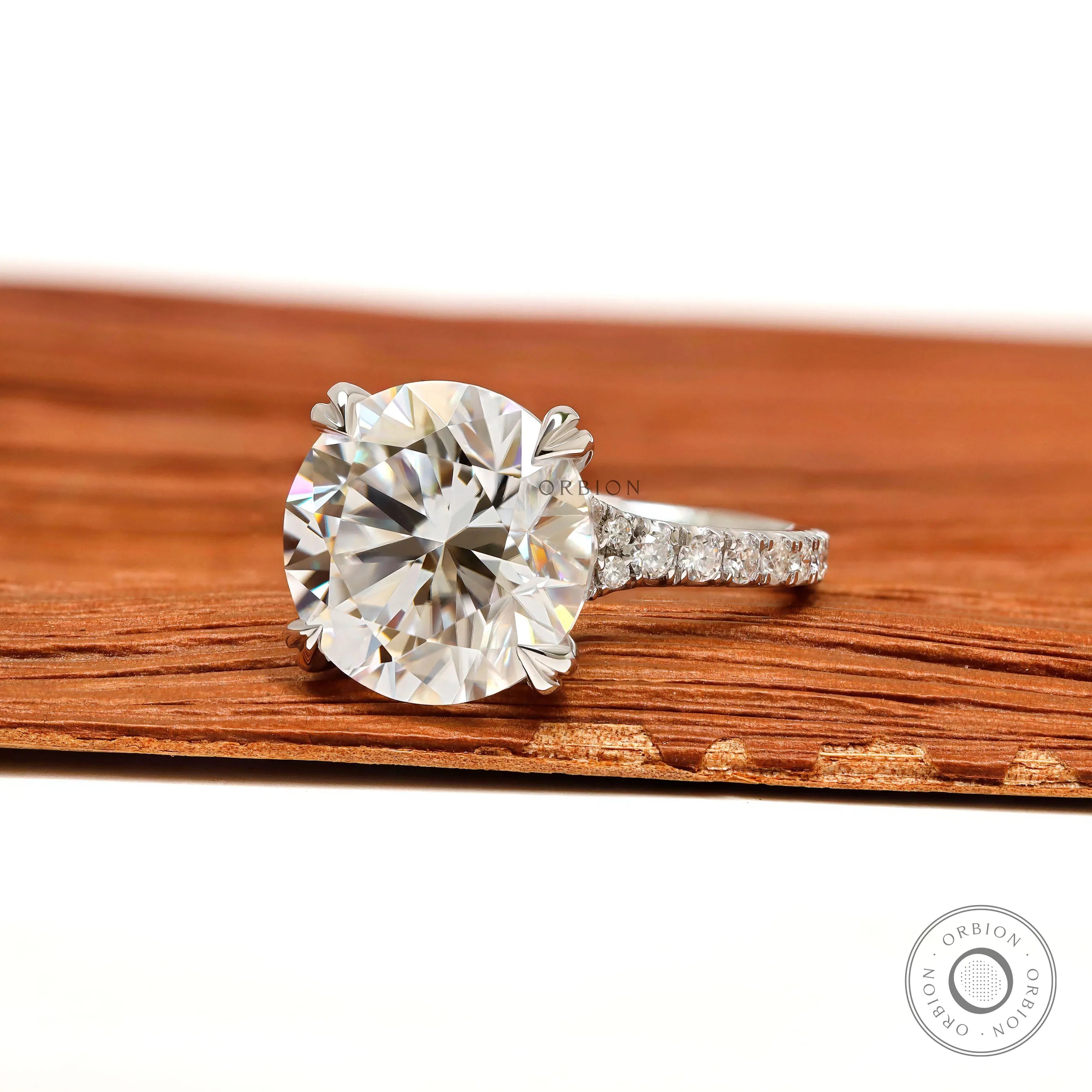 Elegant 4.7 CT round cut moissanite engagement ring in 10k white gold with pave split shank