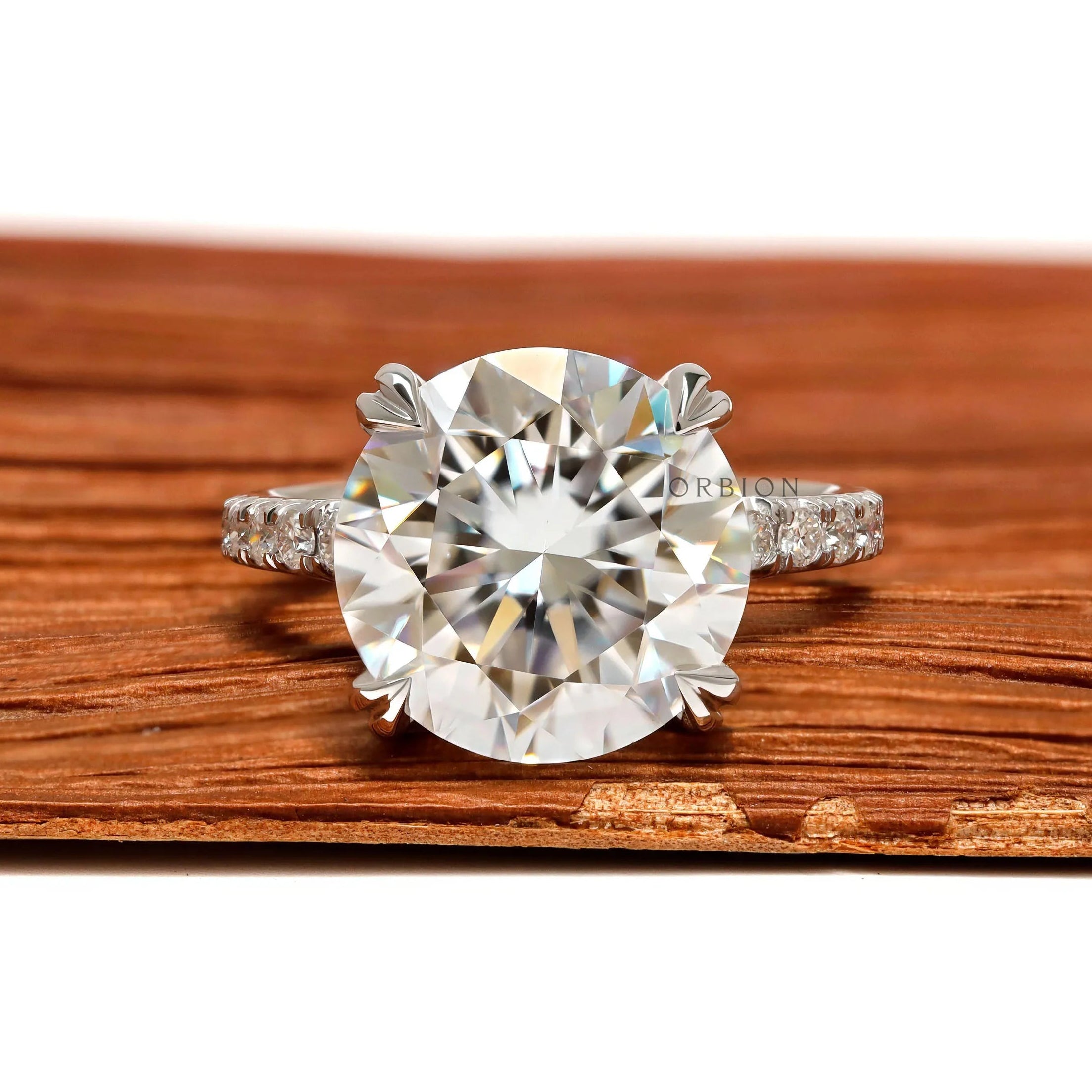 Large round cut moissanite or lab diamond cathedral engagement ring, 10.5 MM solitaire, pave split shank, 10k white gold