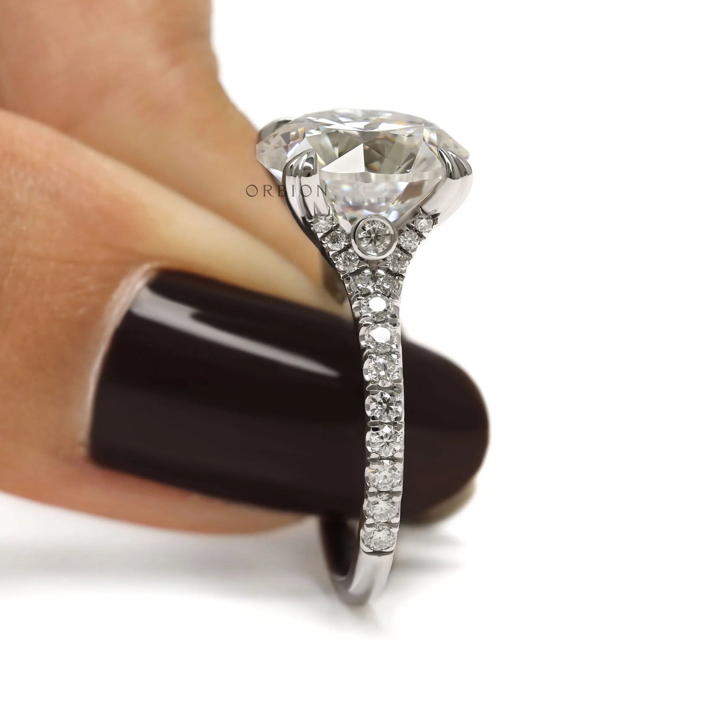 Stunning 4.7 CT round cut moissanite engagement ring with pave split shank in 10k white gold