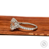 Cathedral engagement ring featuring large round moissanite solitaire, 10.5 MM, 10k white gold, split shank
