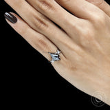 Statement black moissanite ring with 2 CT kite cut gemstone in a platinum cluster setting