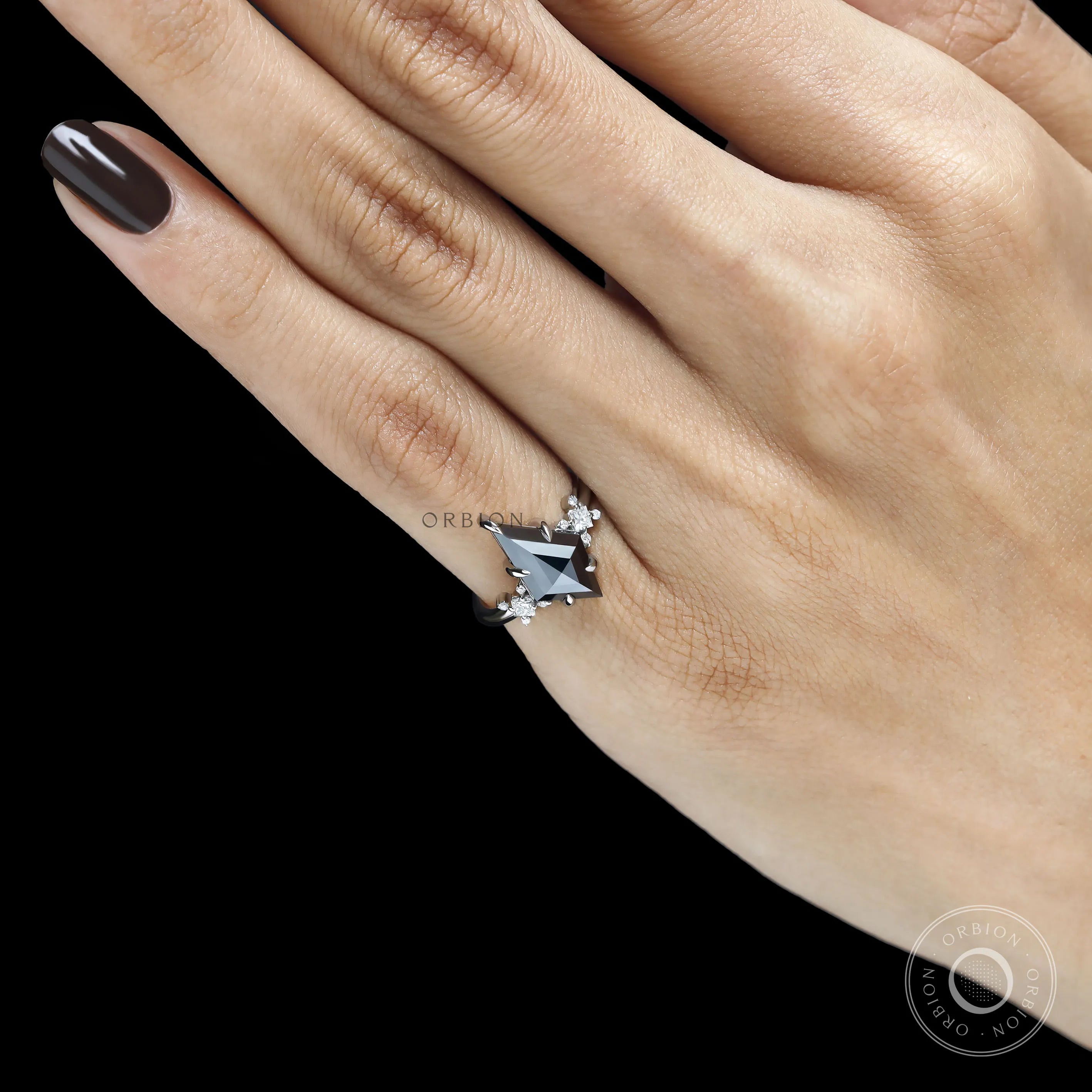 Statement black moissanite ring with 2 CT kite cut gemstone in a platinum cluster setting