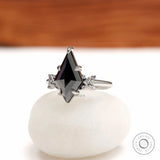 Gothic black moissanite engagement ring featuring 2 CT kite cut center stone