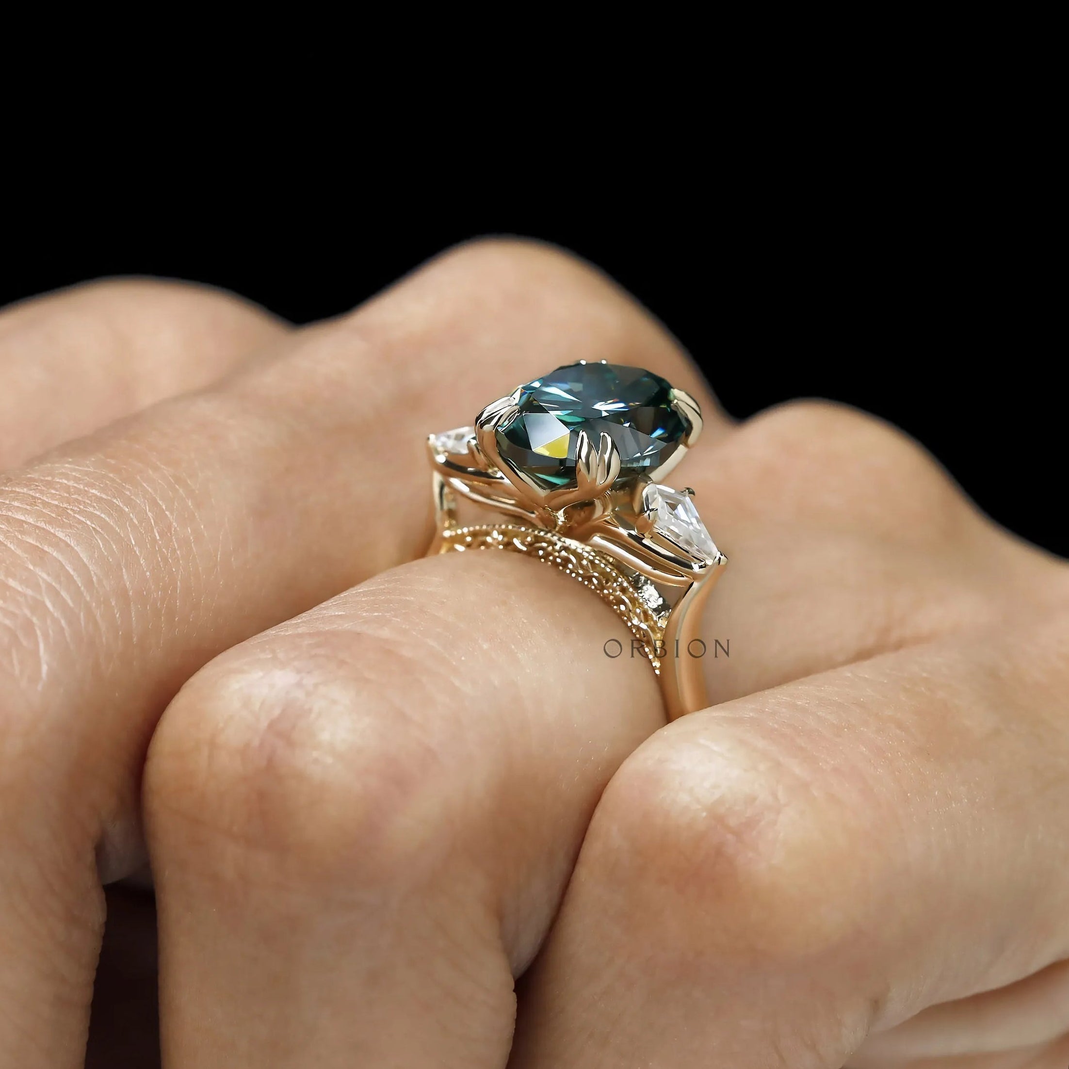 Floral bridge three stone engagement ring with kite cut moissanite accents