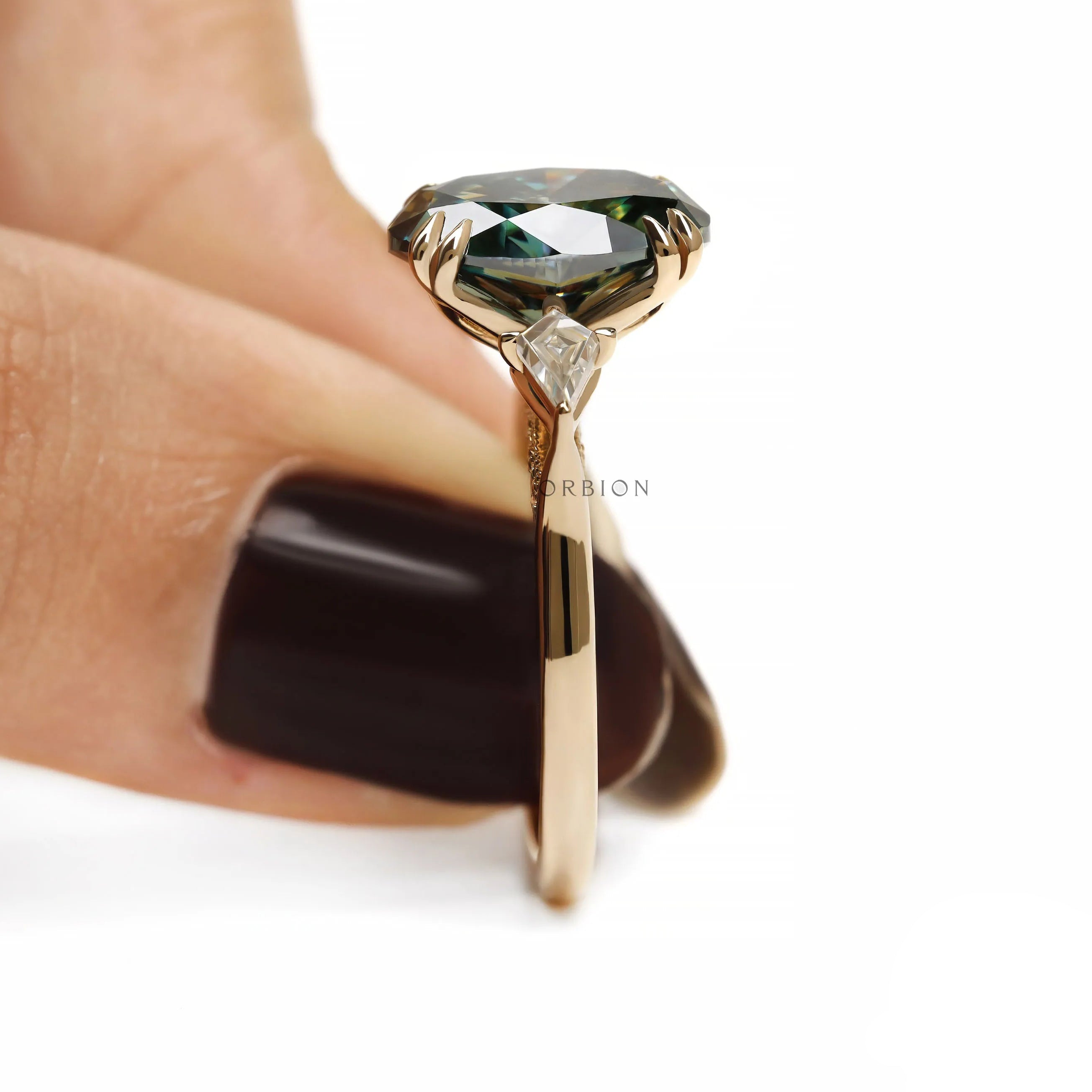 Three stone color moissanite wedding ring with tulip cathedral setting and kite accent details