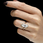 14k yellow gold vintage engagement ring with moval shaped lab diamond, old mine cut and flowing swirl design