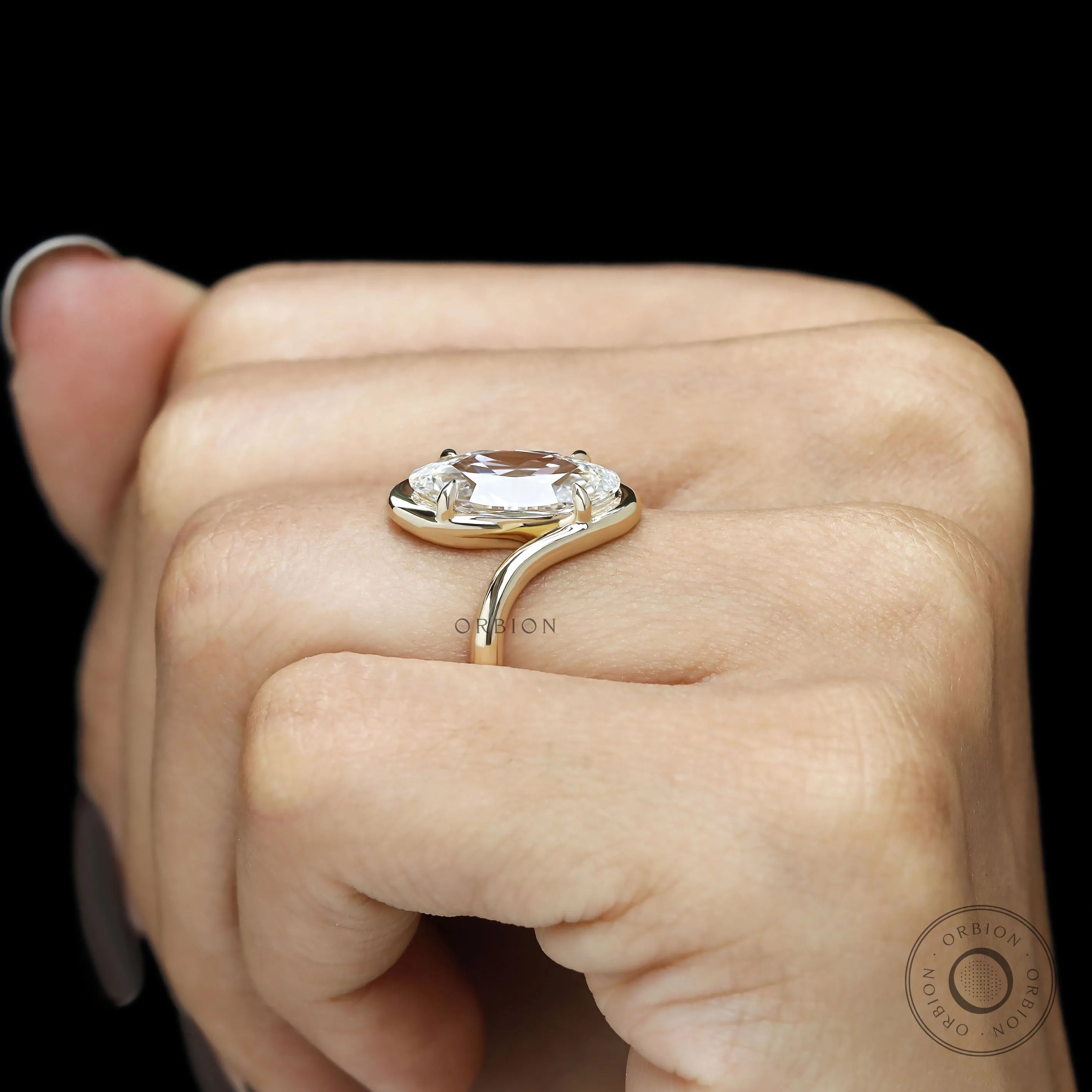 Bypass solitaire ring featuring antique moval lab grown diamond and handcrafted swirl band