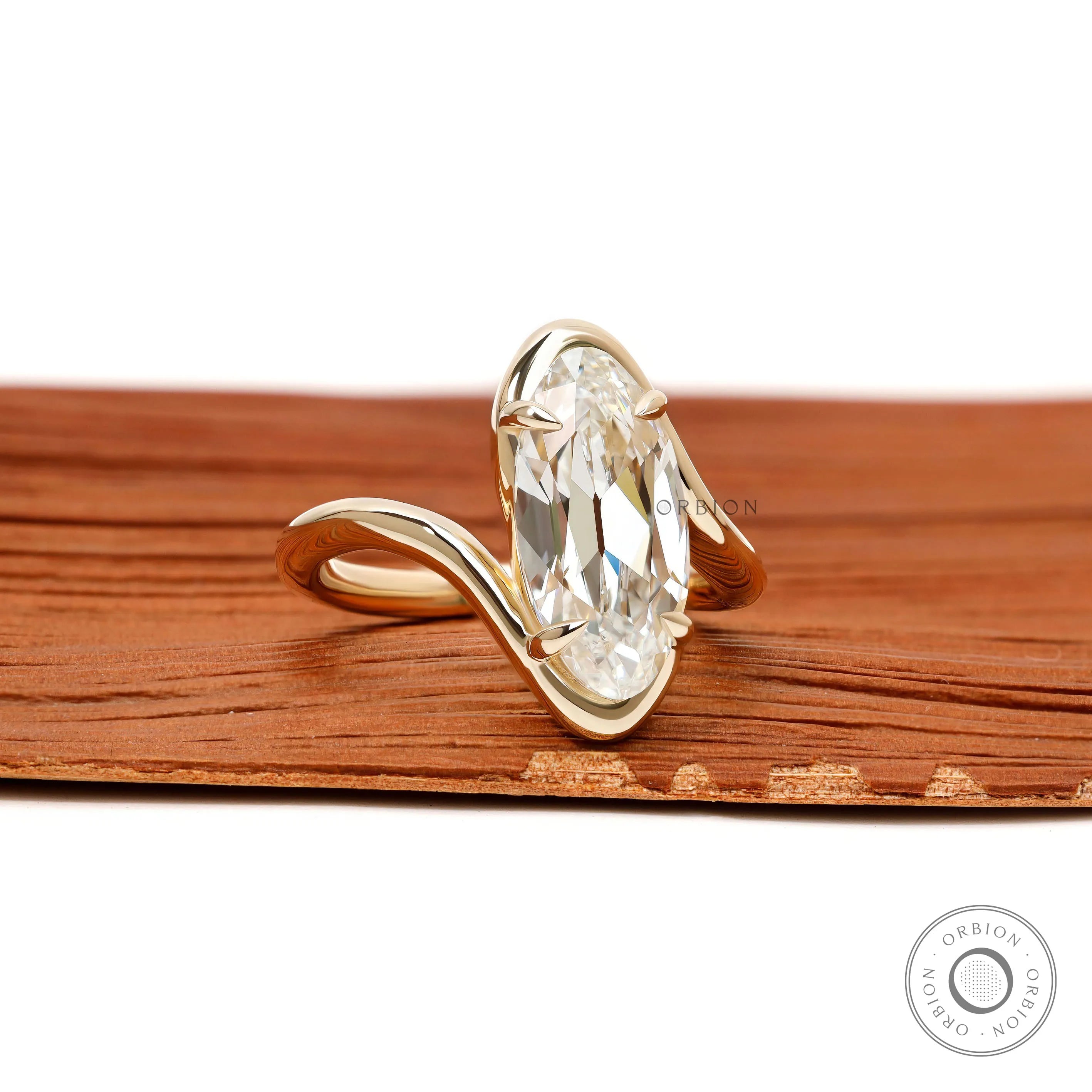 14k yellow gold bypass ring featuring antique moval lab diamond with old mine cut vintage design