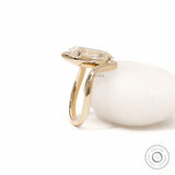 Old mine cut moval lab diamond bypass engagement ring crafted in 14k yellow gold with artistic swirl shank