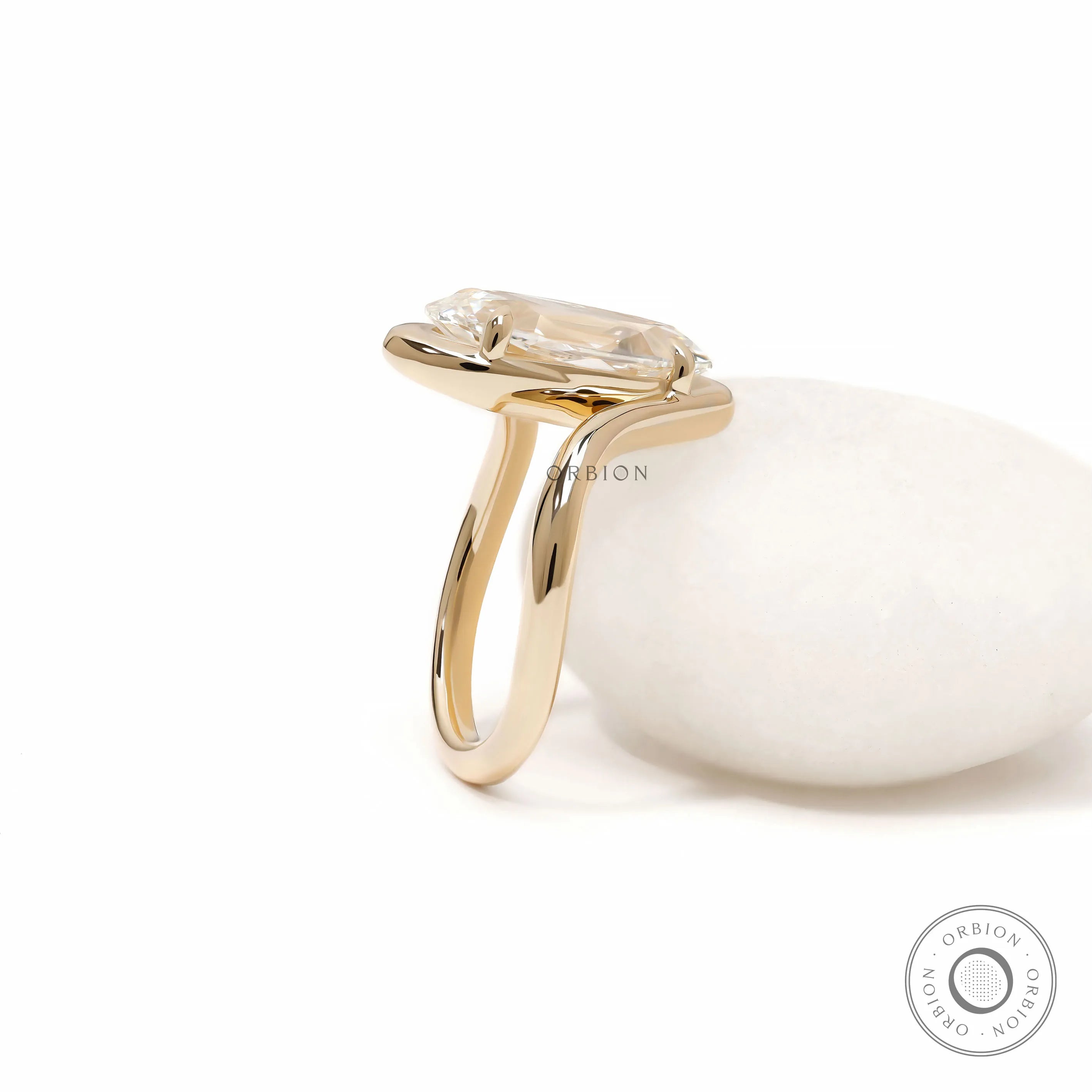 Old mine cut moval lab diamond bypass engagement ring crafted in 14k yellow gold with artistic swirl shank