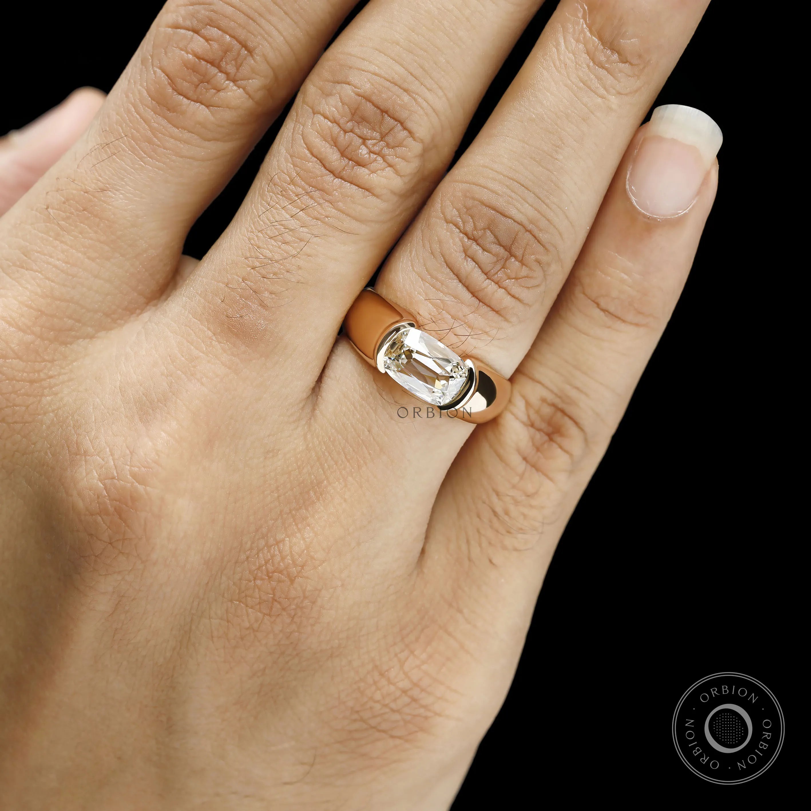 Mens diamond pinky ring in 14k yellow gold with elongated cushion cut stone and modern half bezel setting