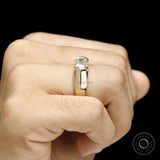 Men’s chunky wedding ring with elongated cushion lab diamond set horizontally in a sleek half bezel setting