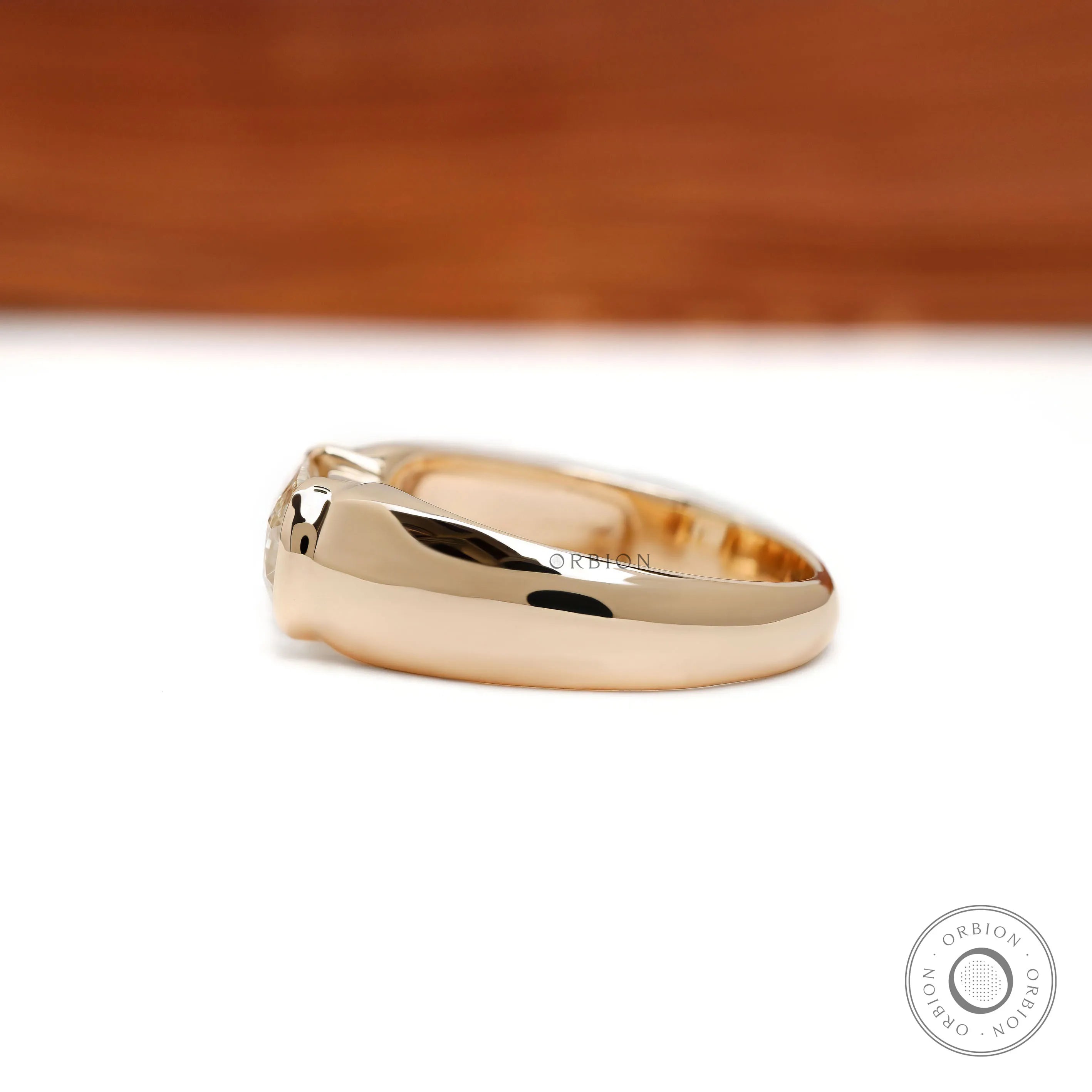 East west lab grown diamond ring for men with elongated cushion cut and modern chunky half bezel design