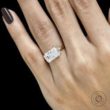 Floating half bezel engagement ring with radiant cut moissanite or lab grown diamond crafted in 14k yellow gold
