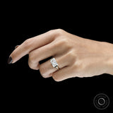 Yellow gold engagement ring with horizontal radiant cut stone and modern floating bezel setting