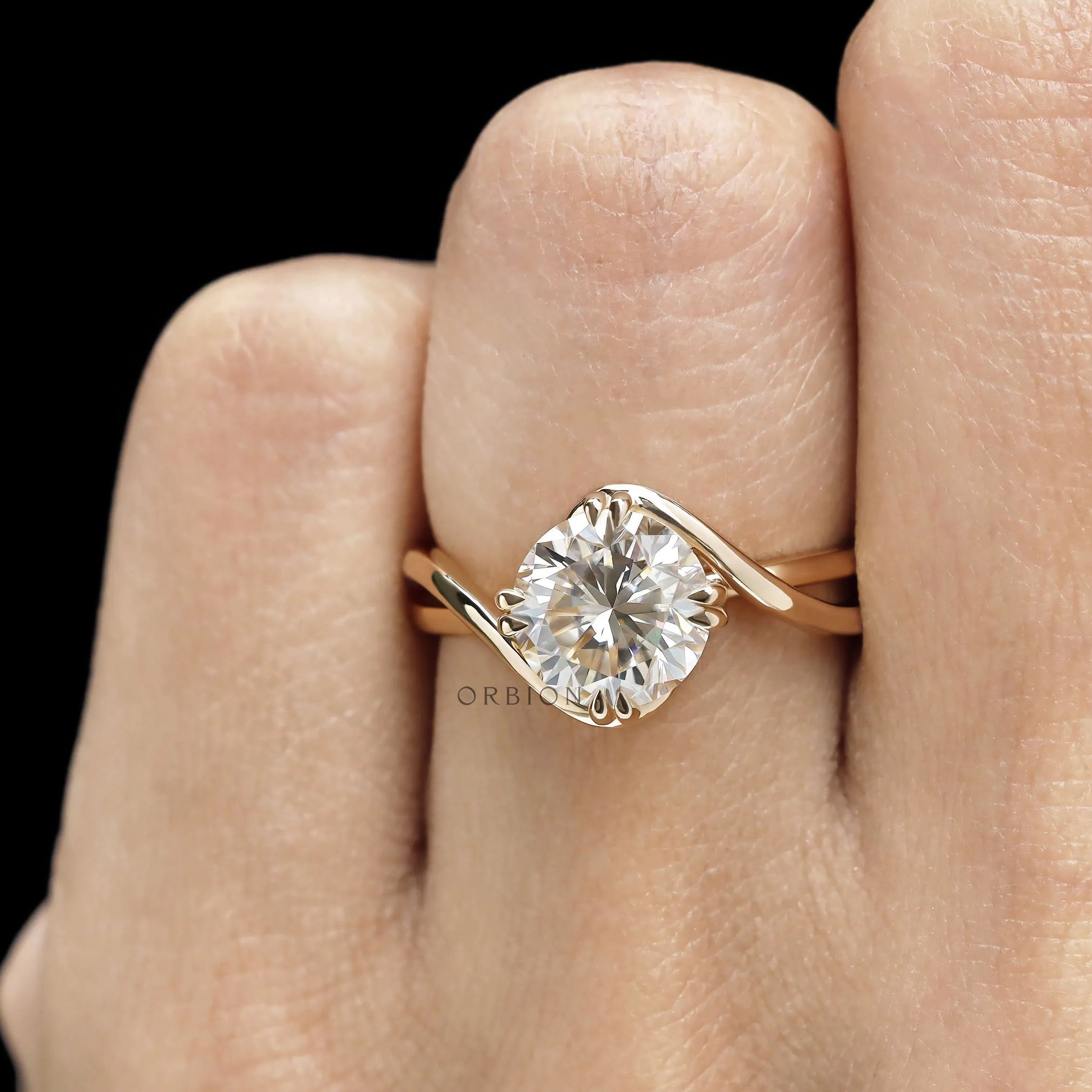 Unique anniversary ring with round cut moissanite solitaire and 14k yellow gold craftsmanship