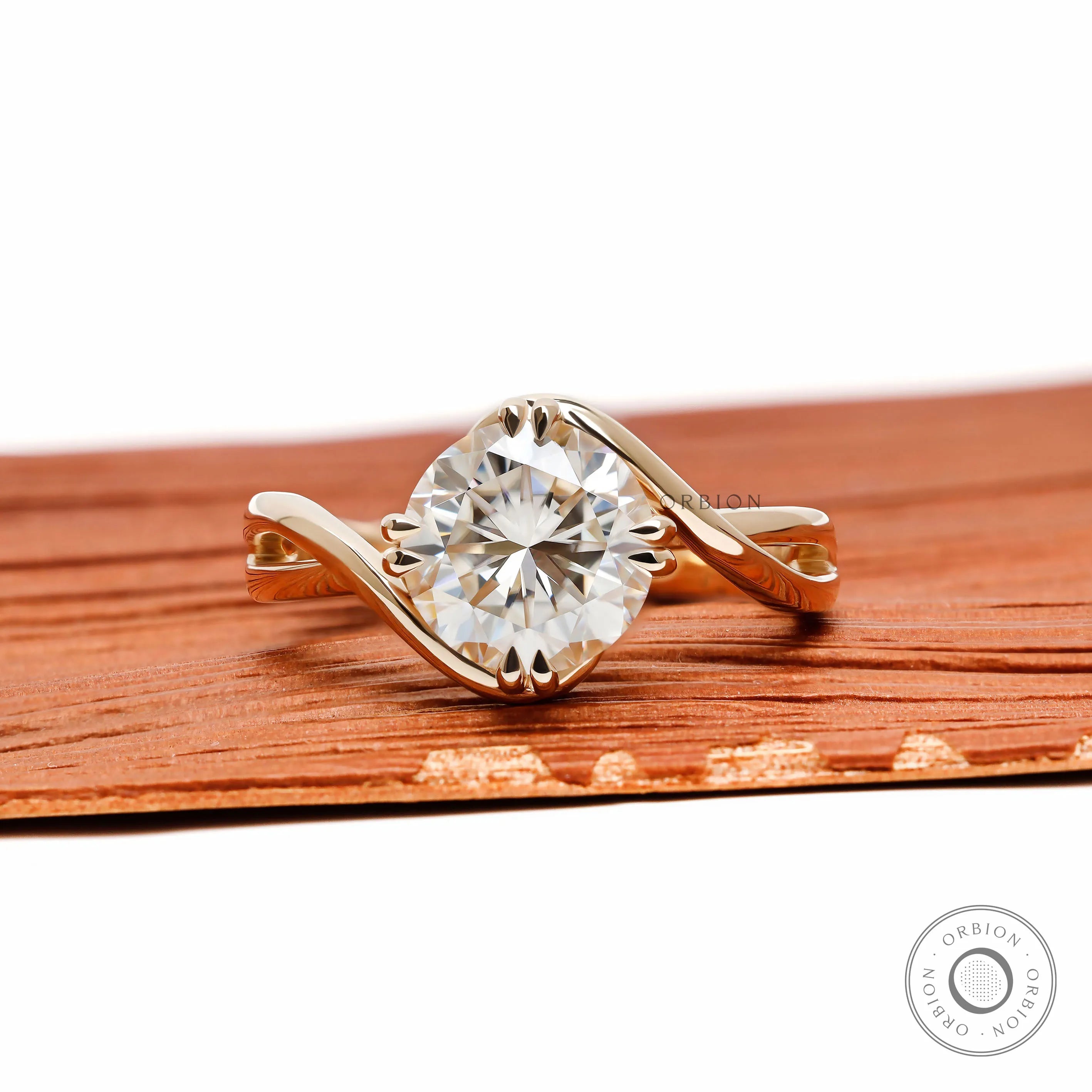 Crossover bypass round cut moissanite engagement ring with compass setting in 14k yellow gold 