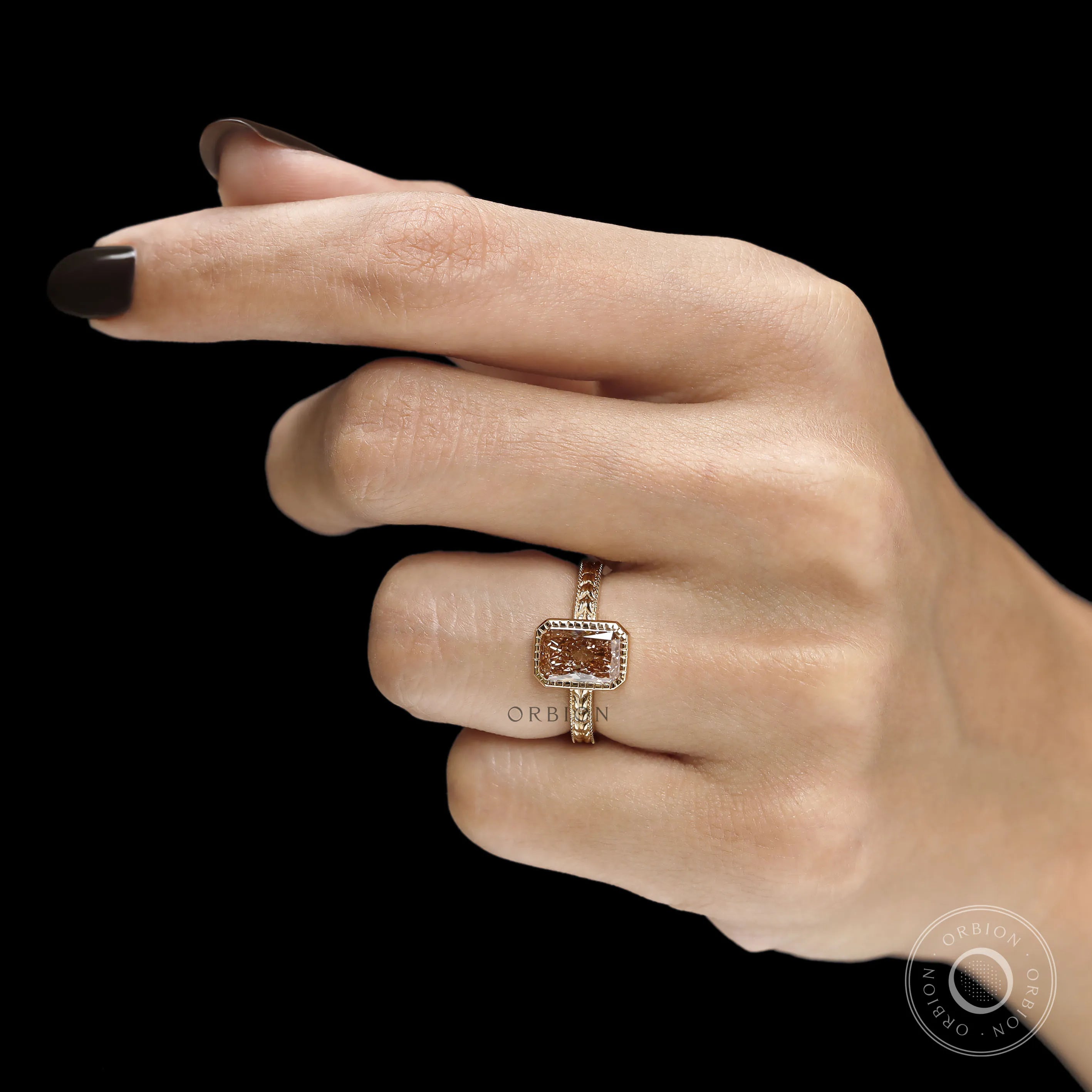 Pink diamond wedding ring with vintage bezel setting, botanical leaf design and 18k yellow gold band