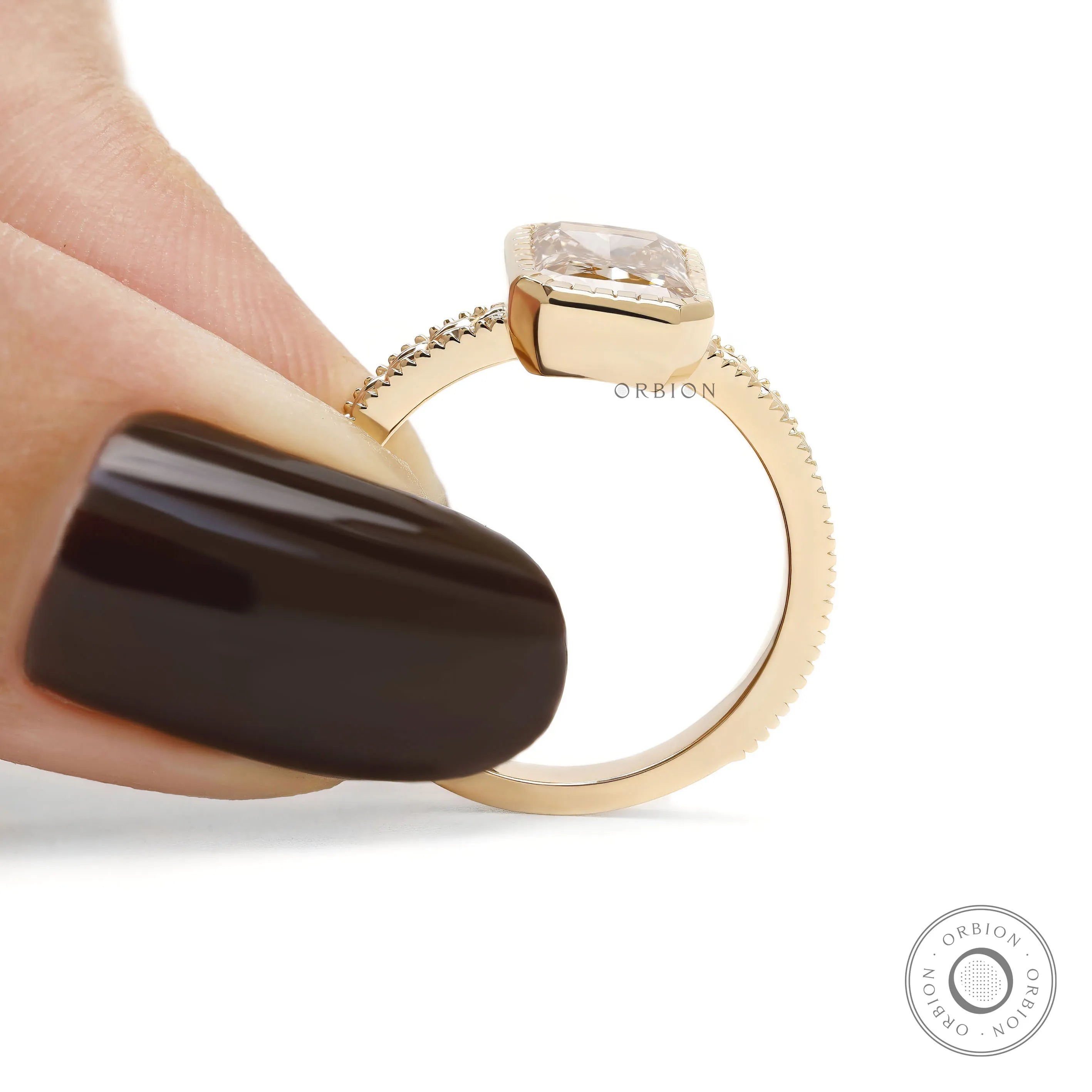 Nature inspired bridal ring with pink gemstone diamond, Victorian engraving, and bezel set design in gold