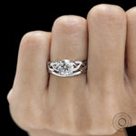 Story telling ring with two round gemstones, 14k white gold mixed shank, and personalized birthstone design