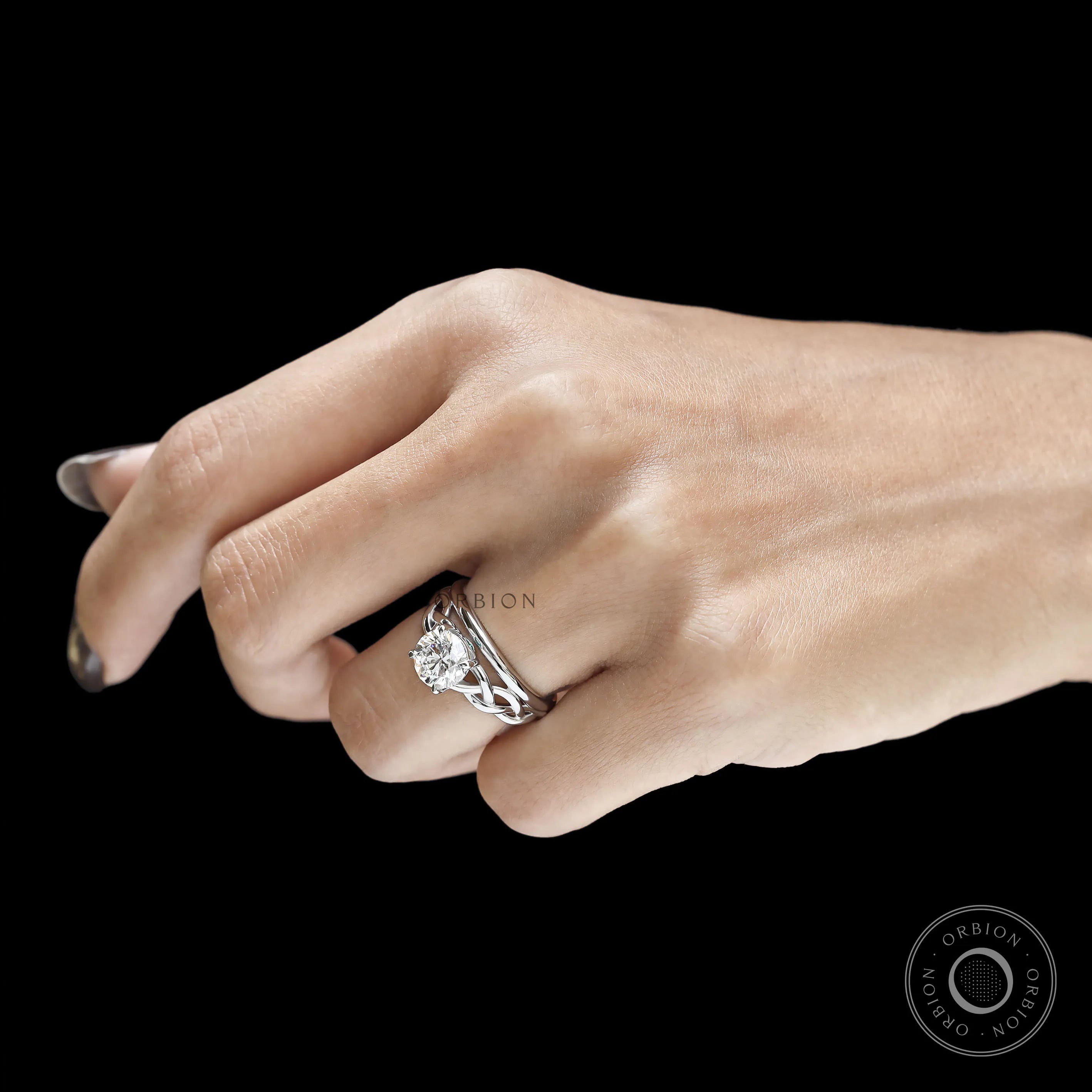 Custom two stone engagement ring with round lab diamond or moissanite, braided shank and 14k white gold craftsmanship