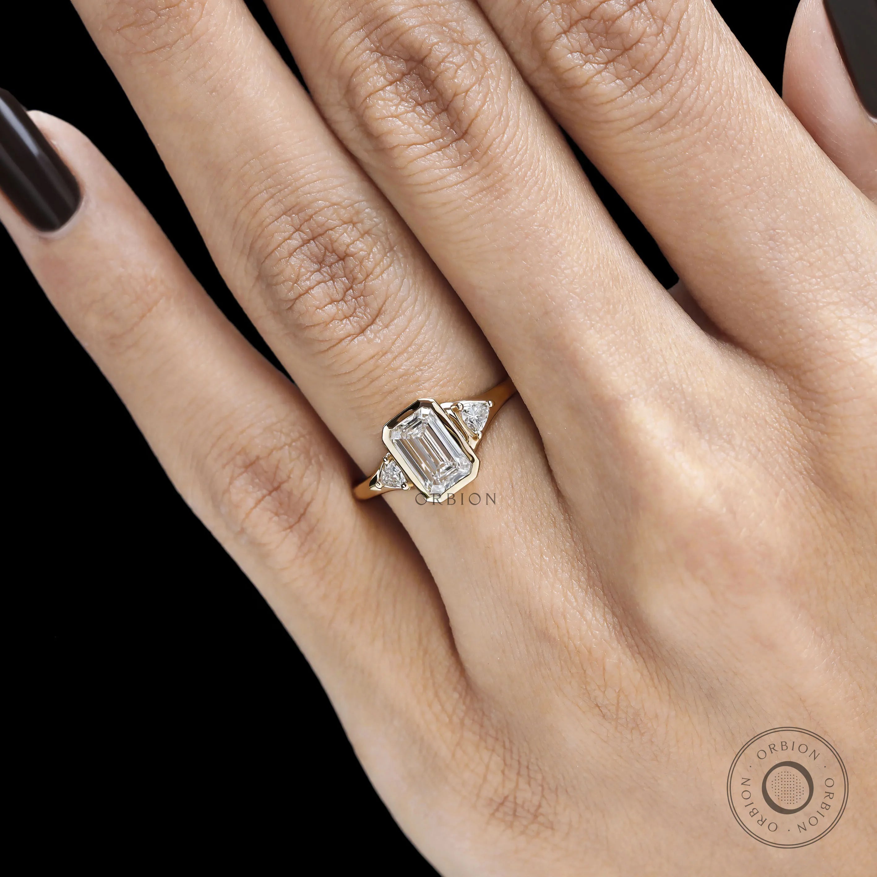 Elegant pinky promise ring with emerald cut lab diamond or moissanite three stone design in yellow gold
