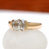 14k yellow gold chunky signet ring featuring east west moissanite