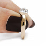 Unique chunky gold promise ring featuring elongated cushion moissanite