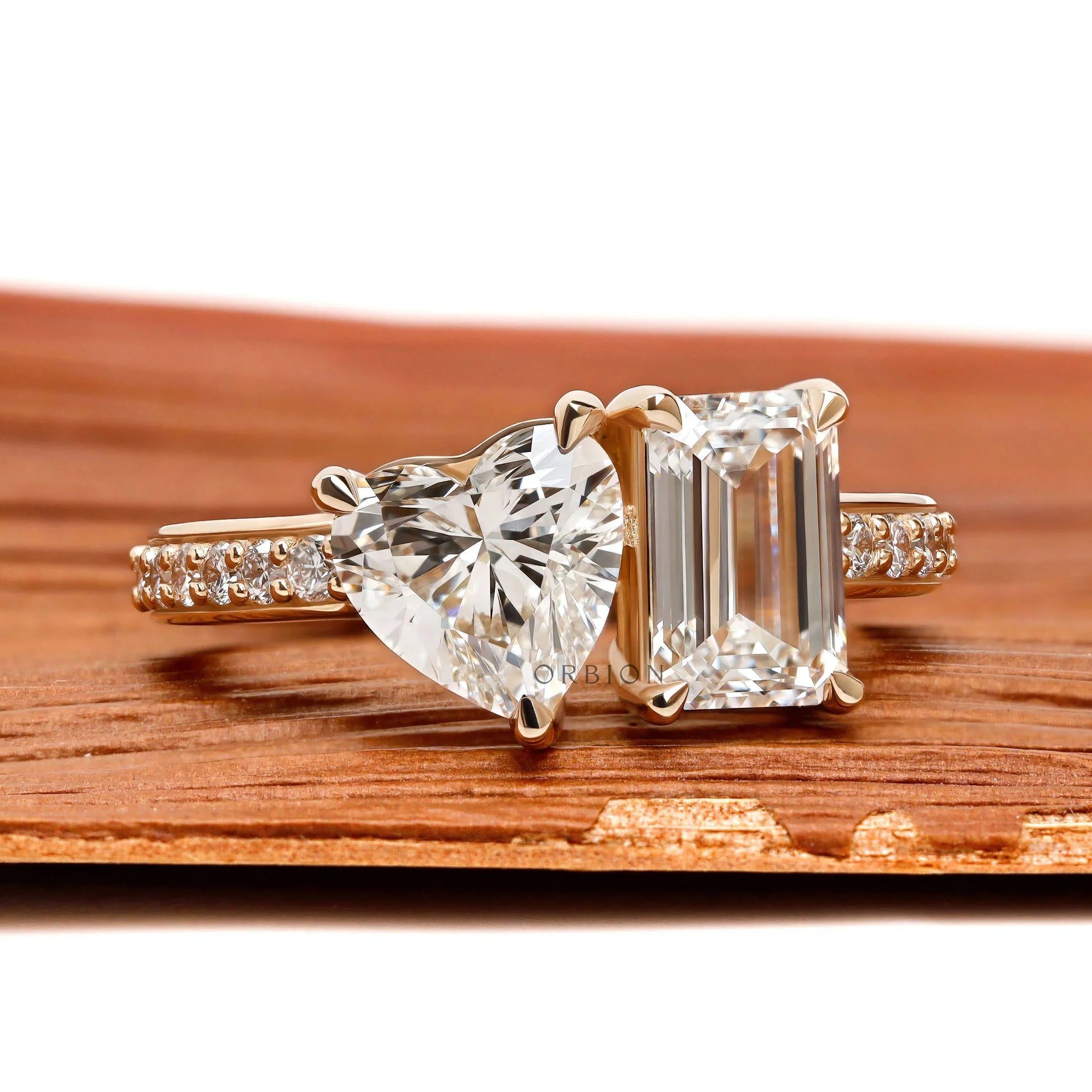 Romantic two stone diamond engagement ring with sparkling pave shank